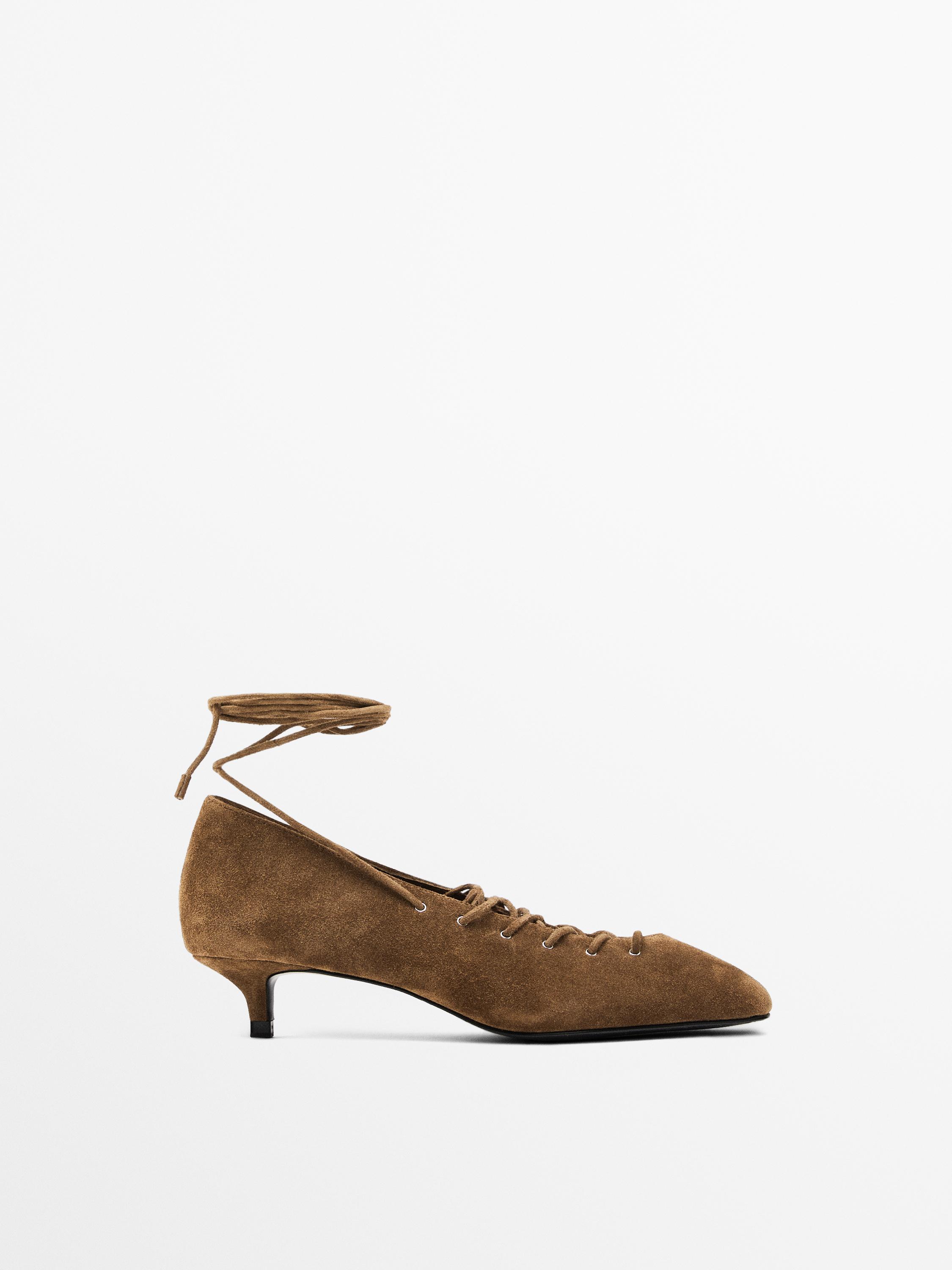 Lace-up high heel shoes