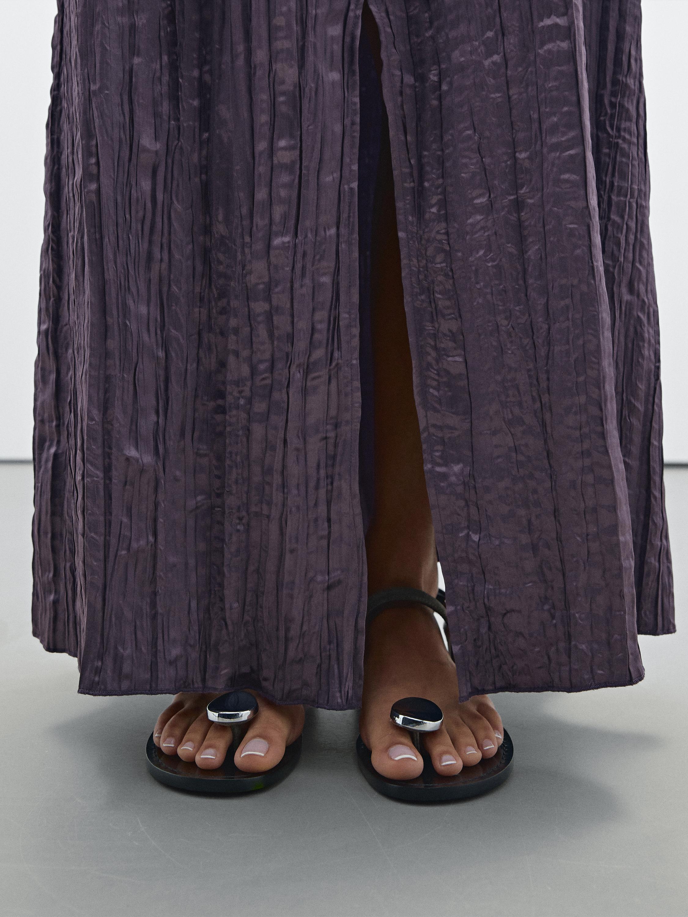 Long pleated halterneck dress
