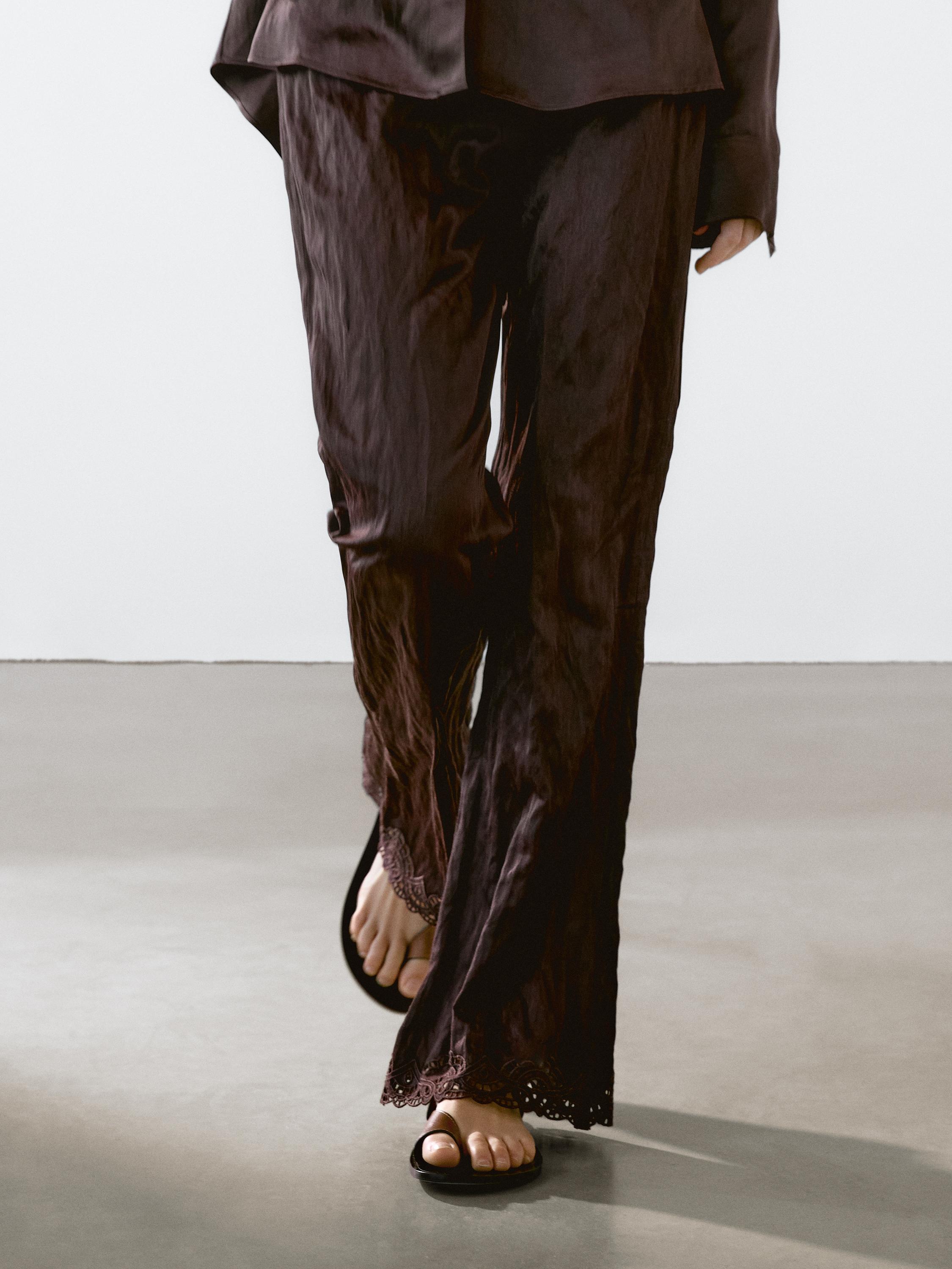 Capri trousers with blonde lace detail