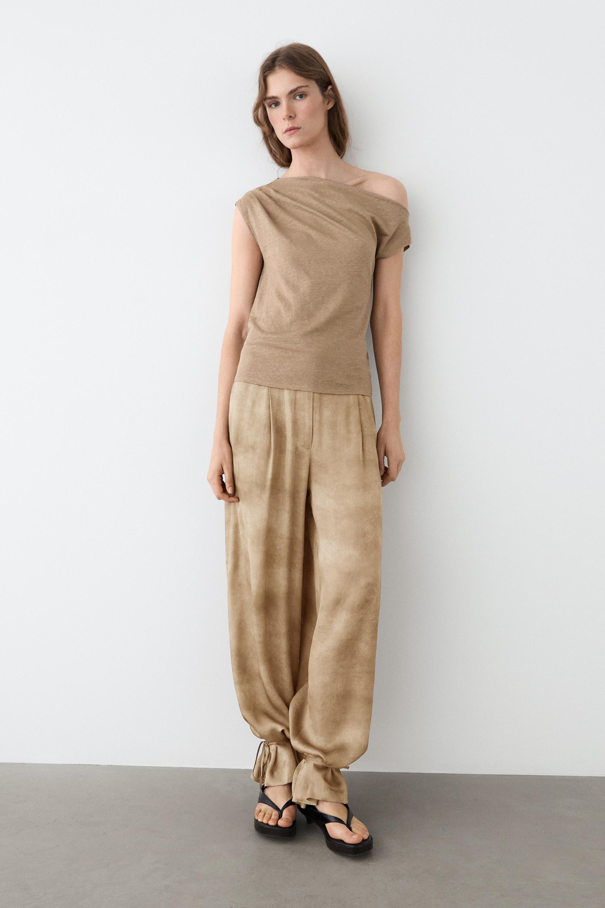 Asymmetric linen blend top with draped detail — Washed