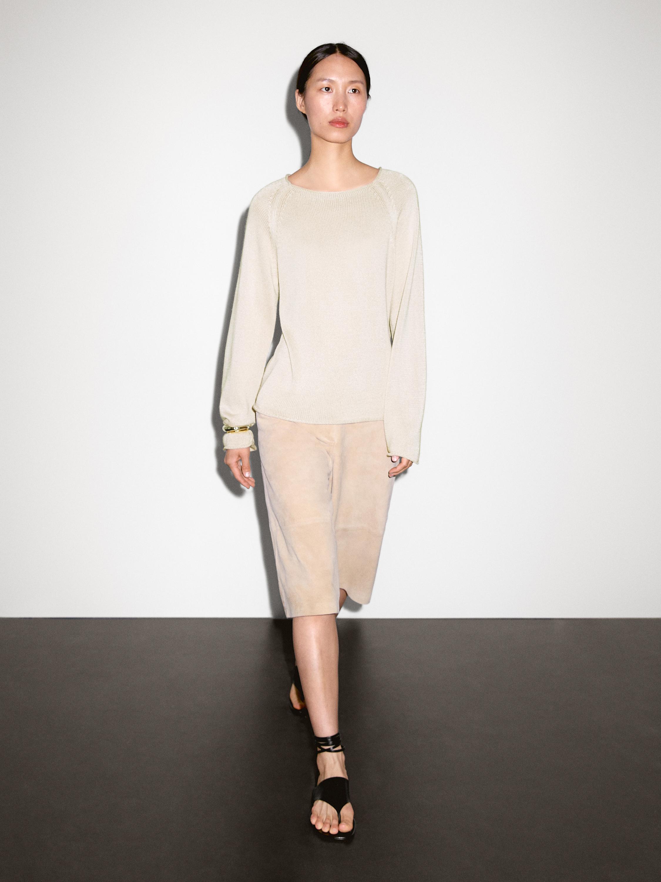 Purl knit cutwork sweater