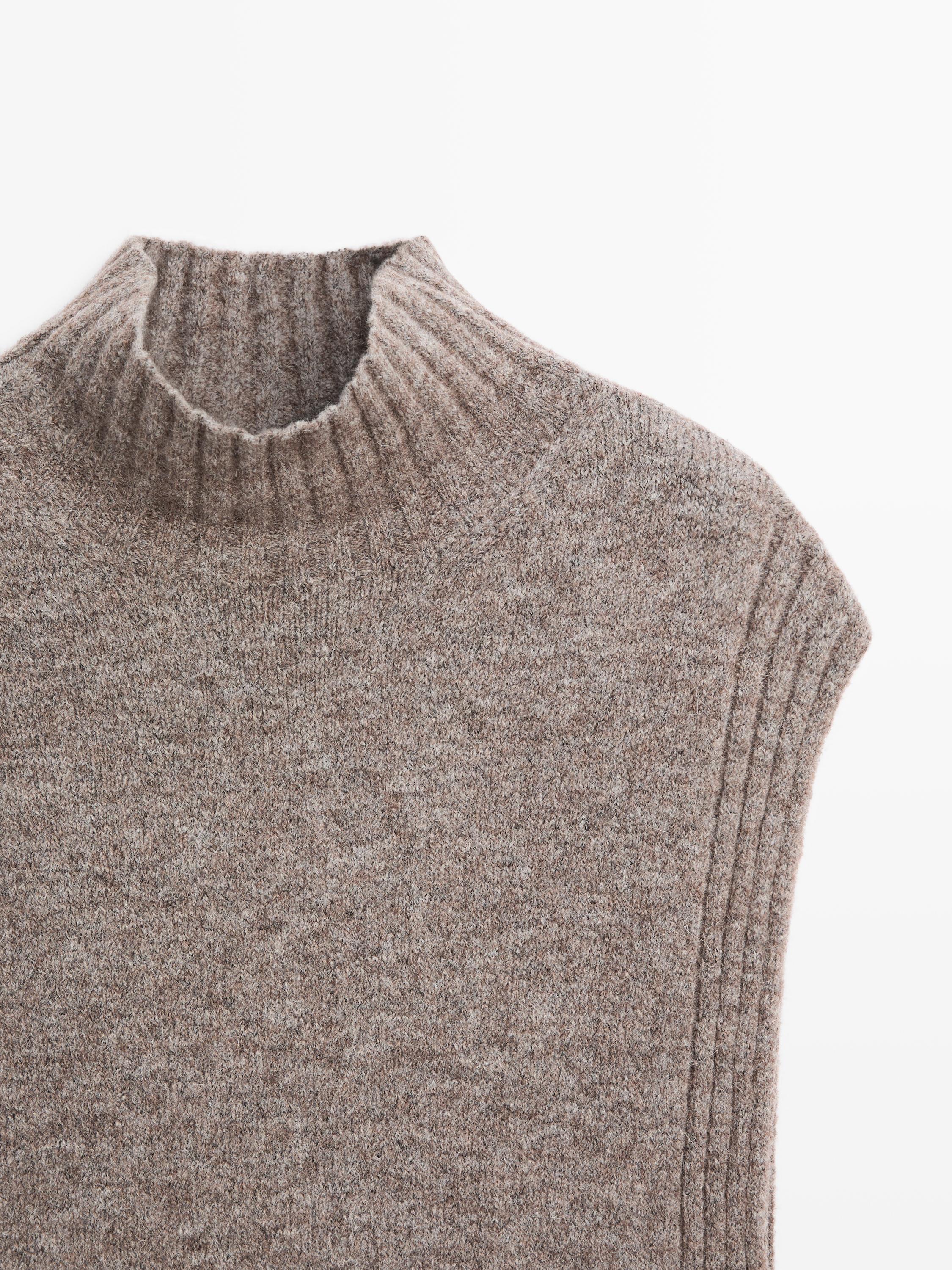 Sleeveless high neck sweater