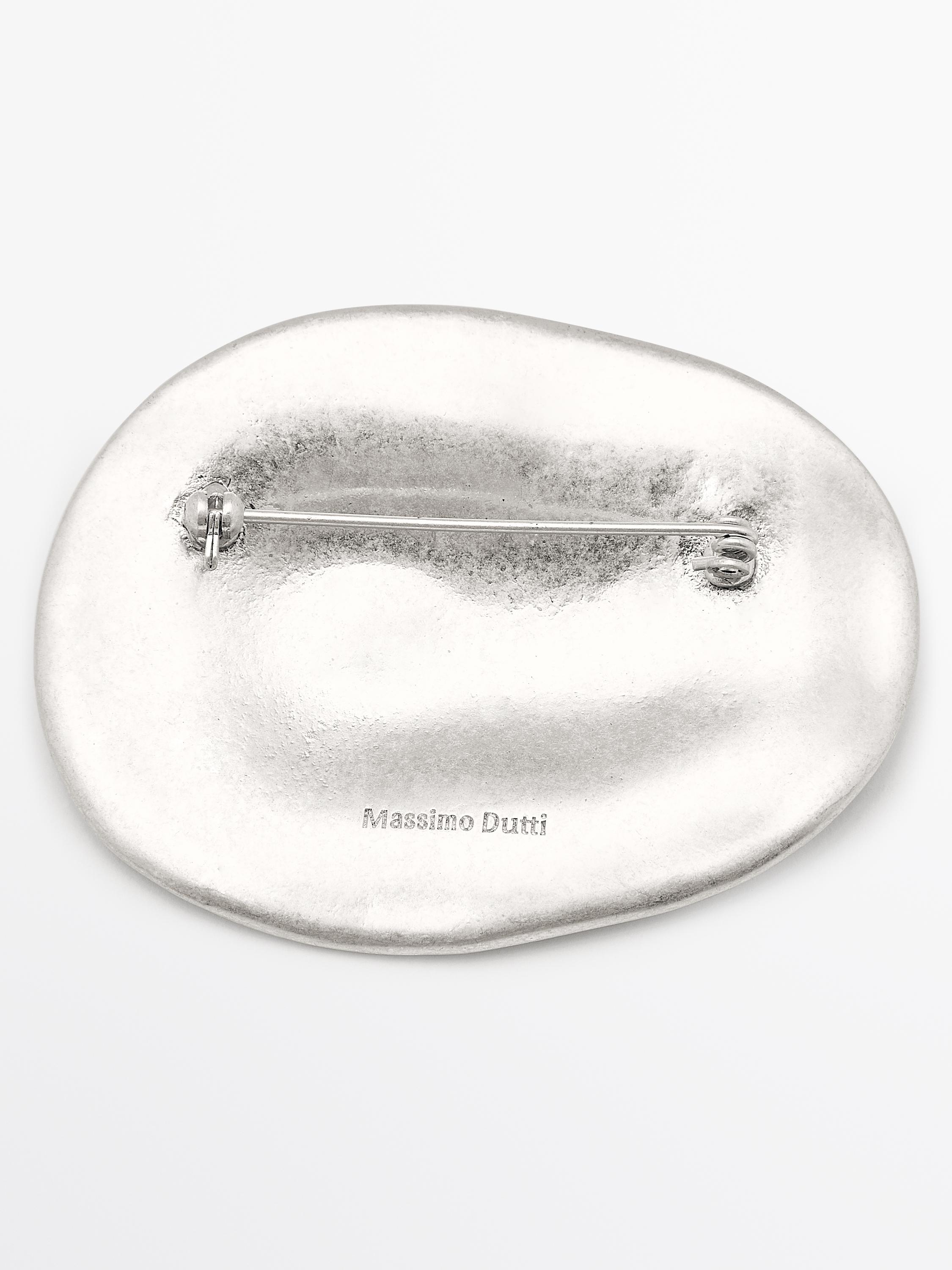 Almond brooch