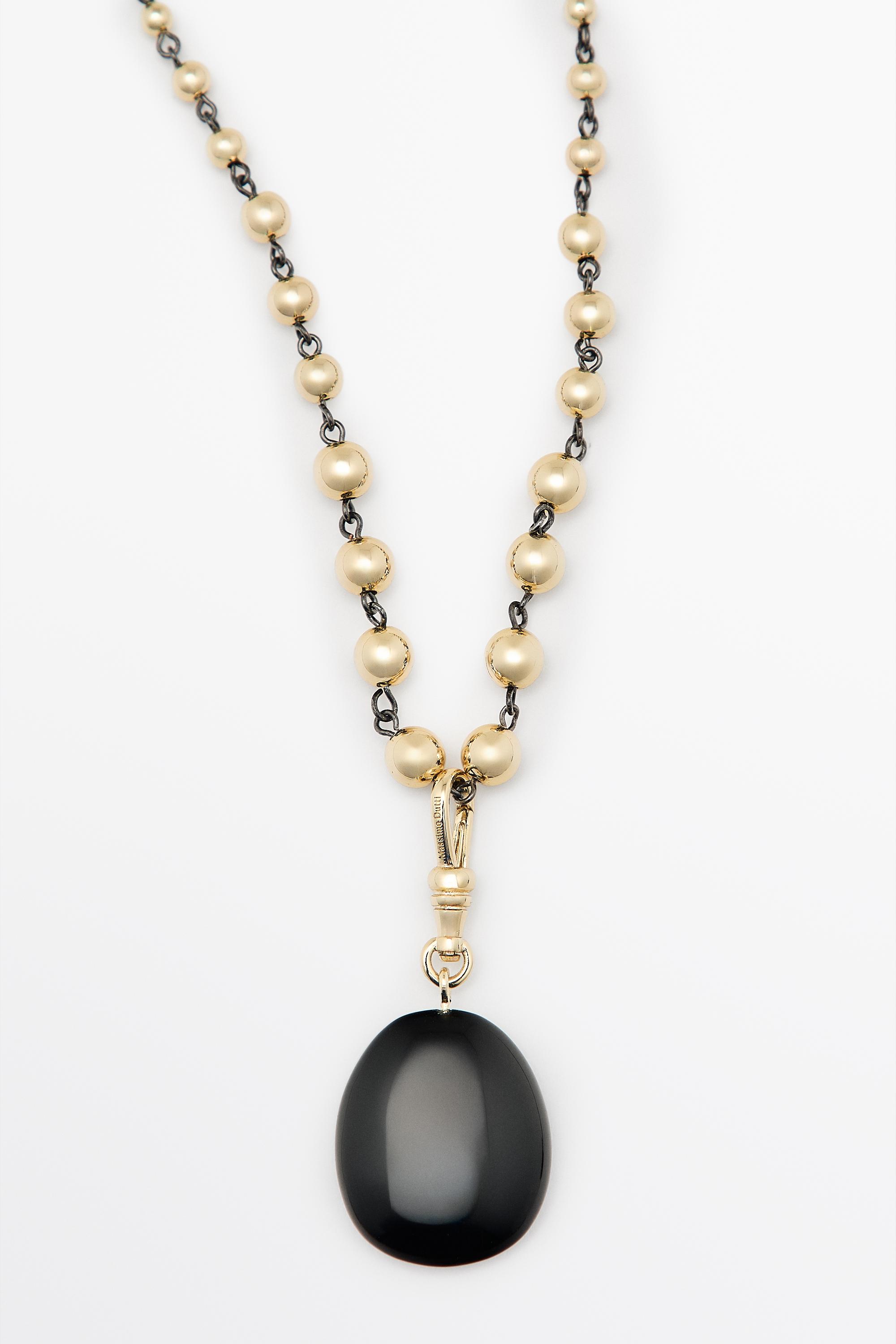Beaded chain necklace with onyx piece — GOLDEN