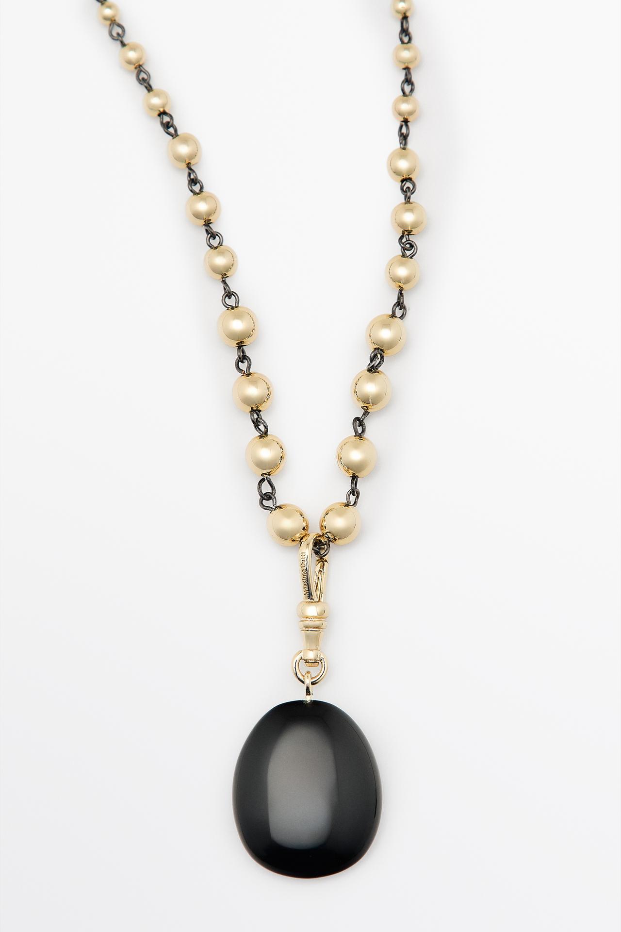 Beaded chain necklace with onyx piece — GOLDEN