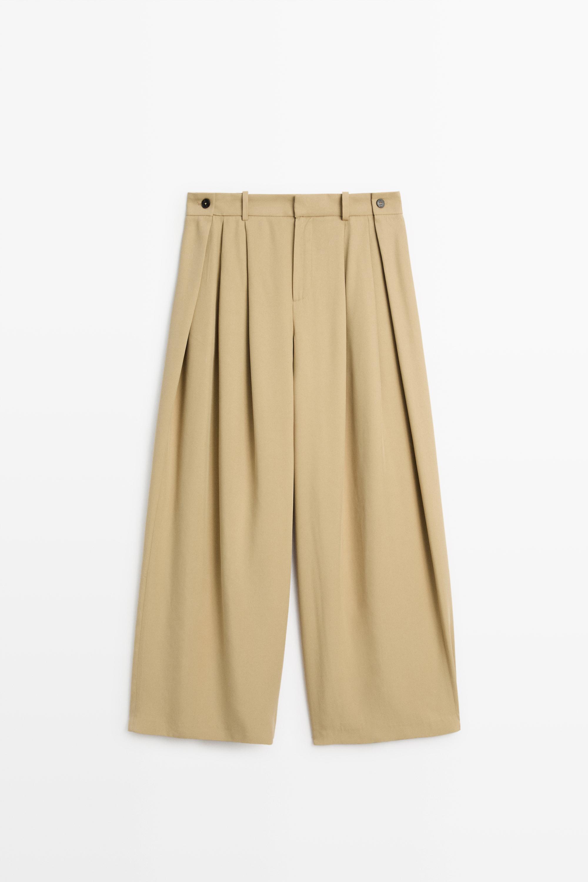 Flowing pleated pants with button detail — BEIGE