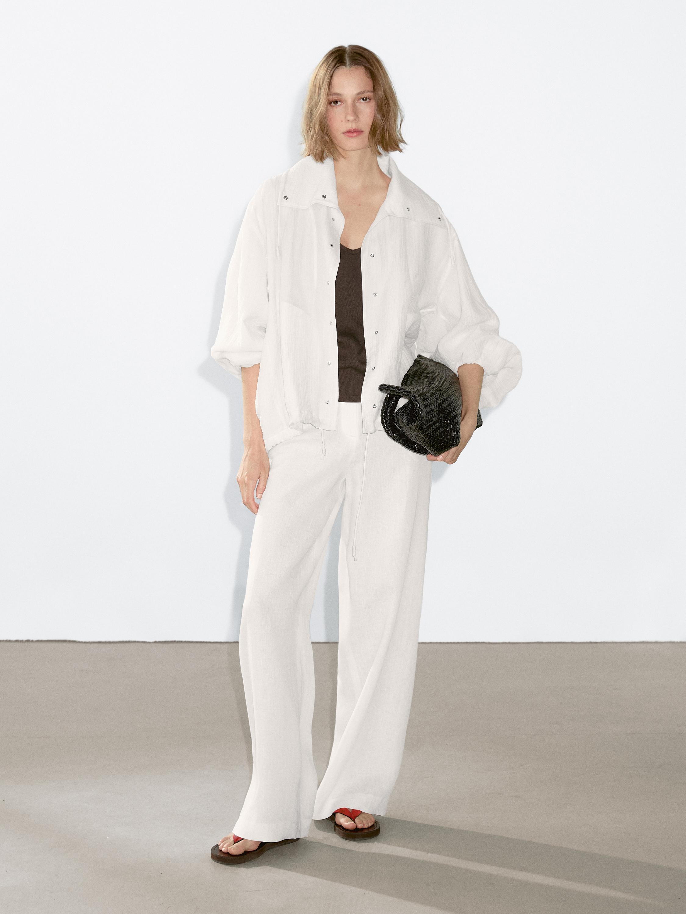 Flowing bomber jacket with voluminous detail