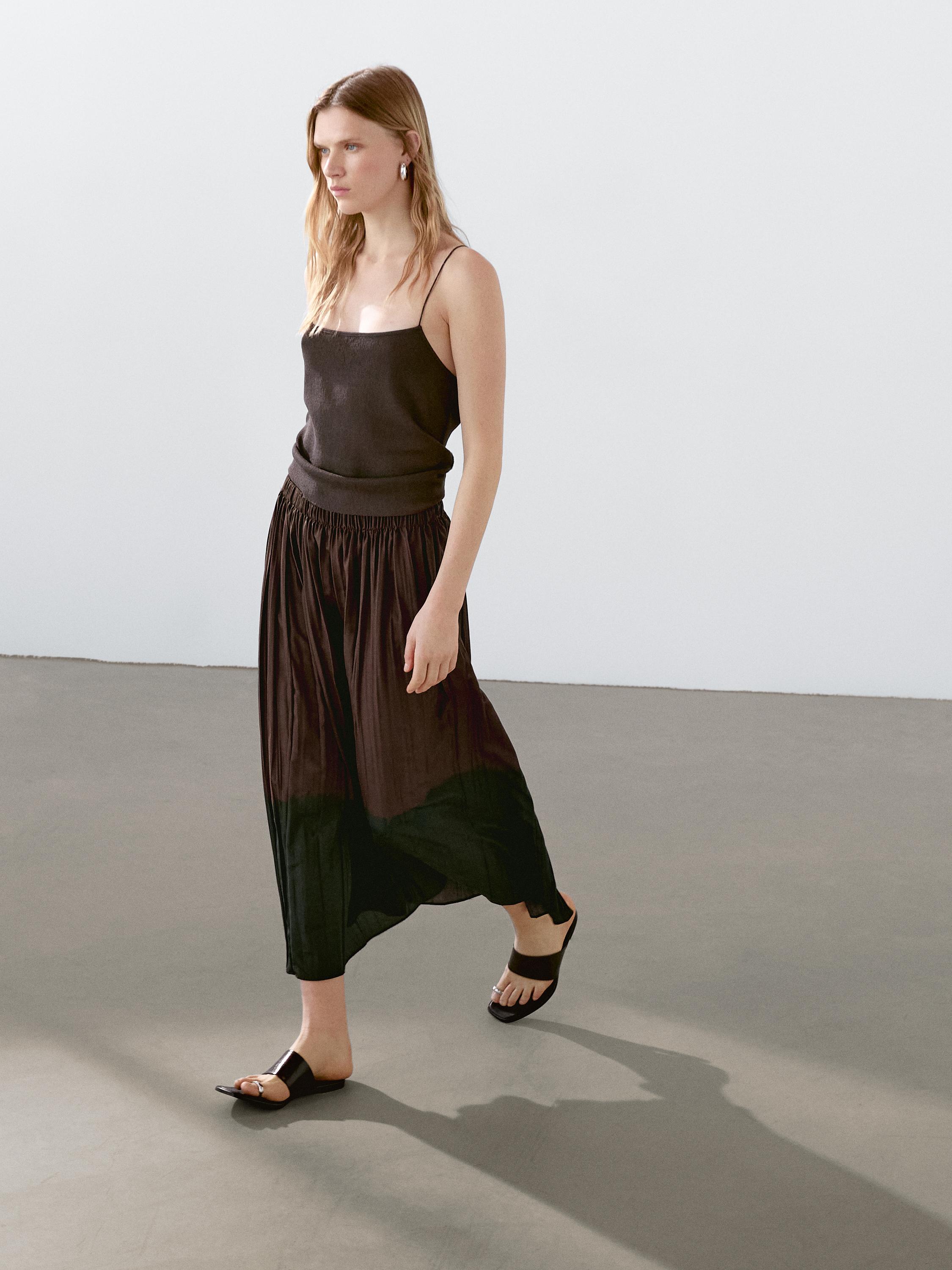 Long flowing pleated skirt