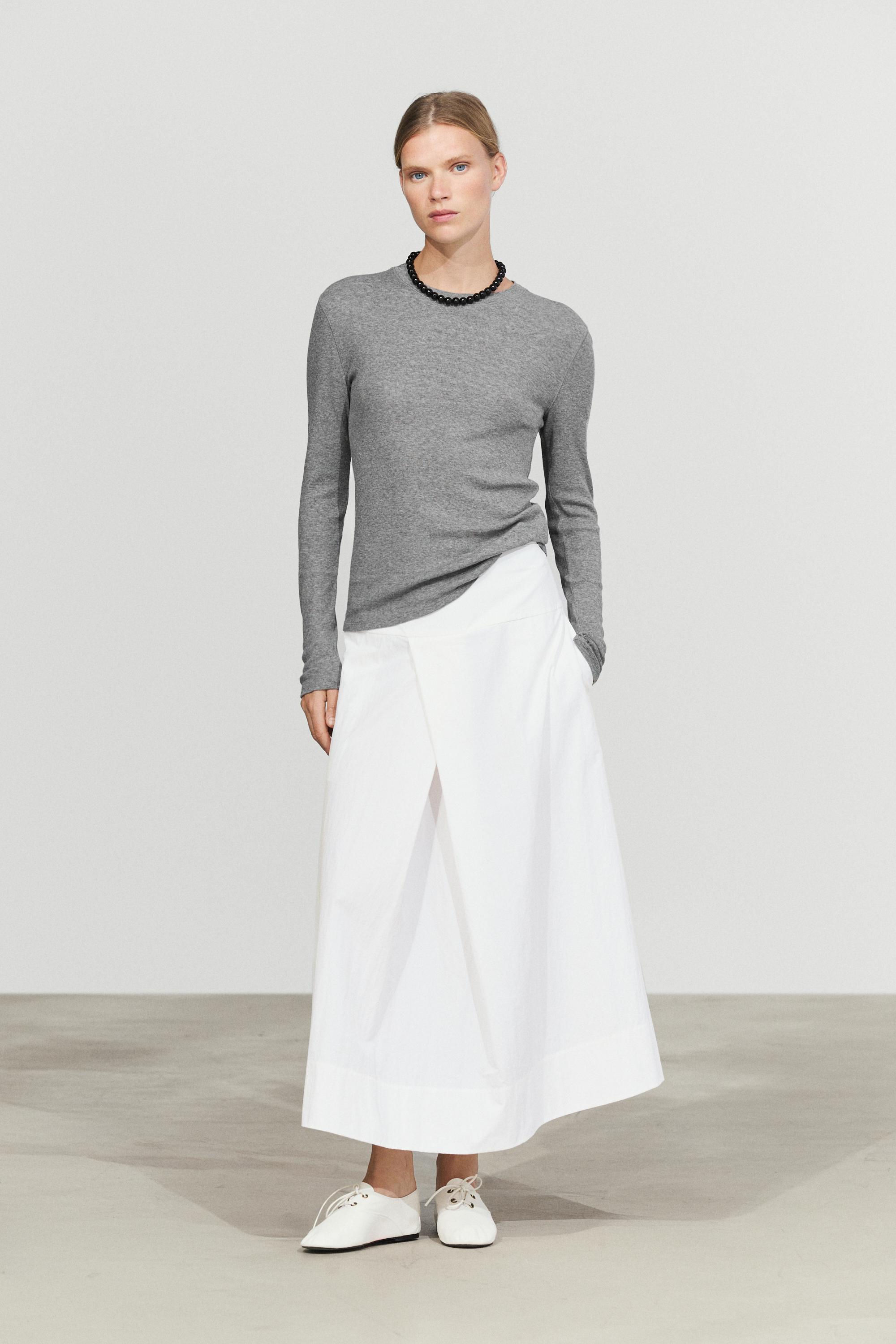 Midi skirt with yoke and pleated detail