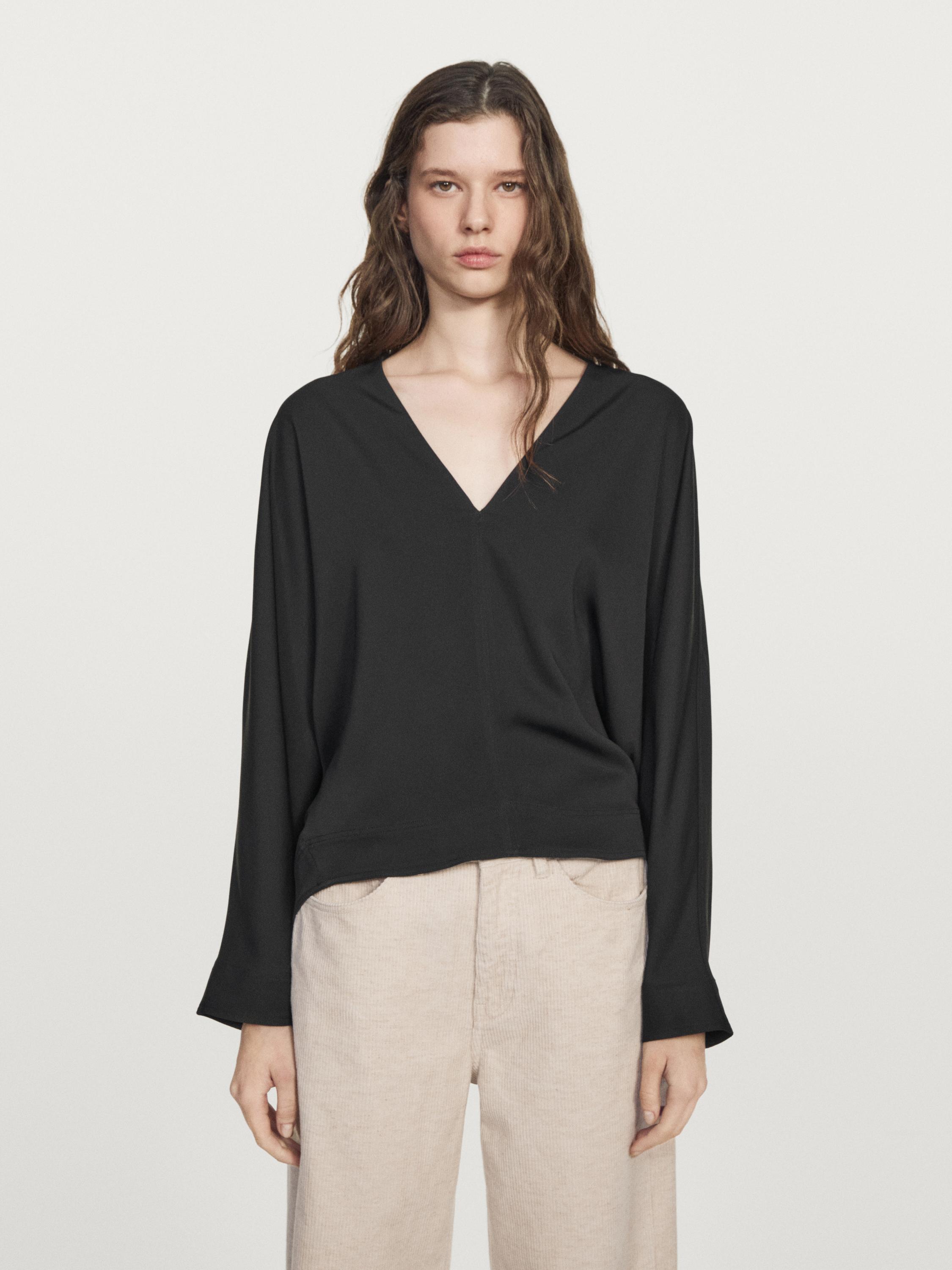 Flowing blouse with V-neckline
