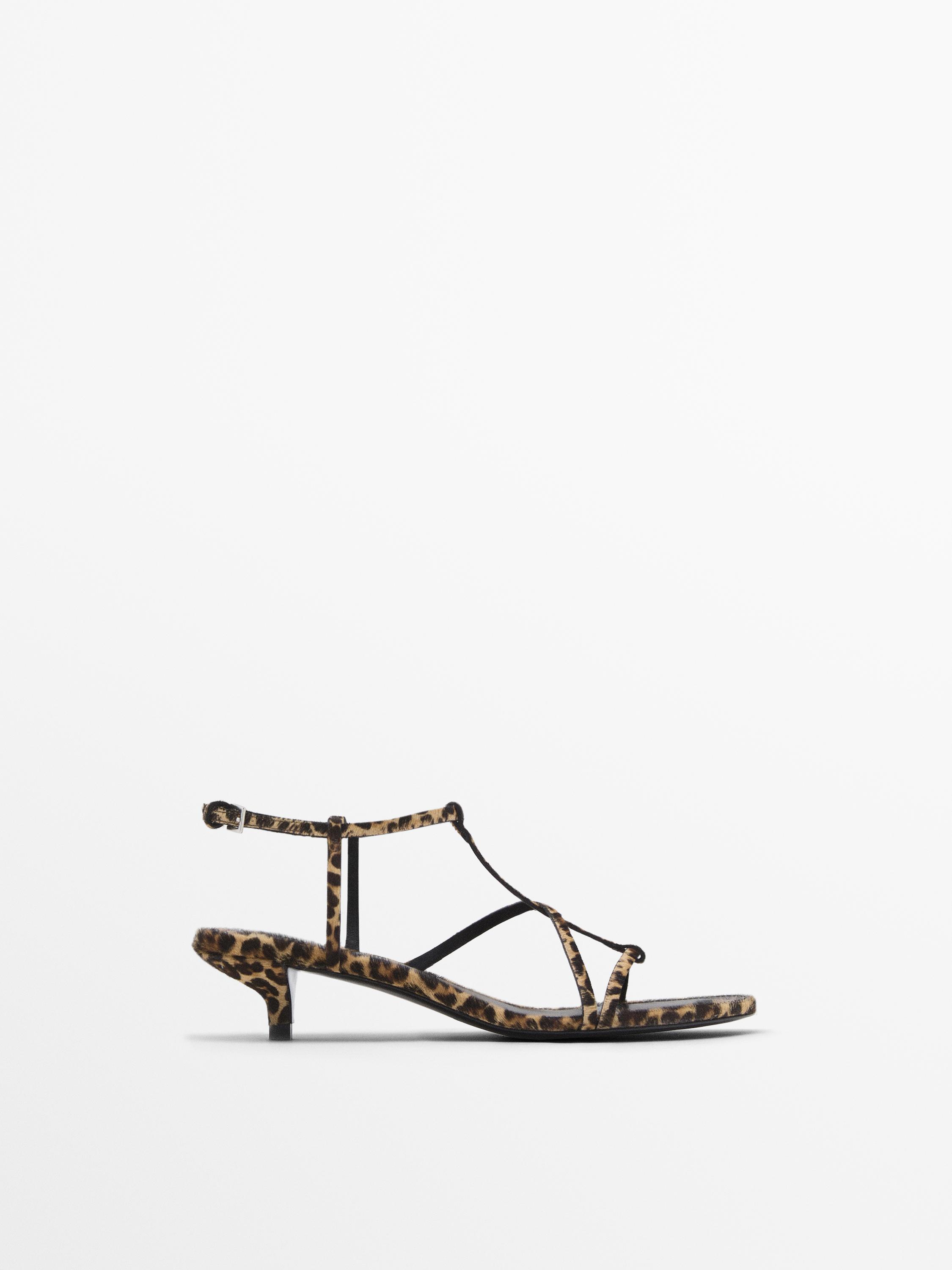 Strappy heeled animal print sandals