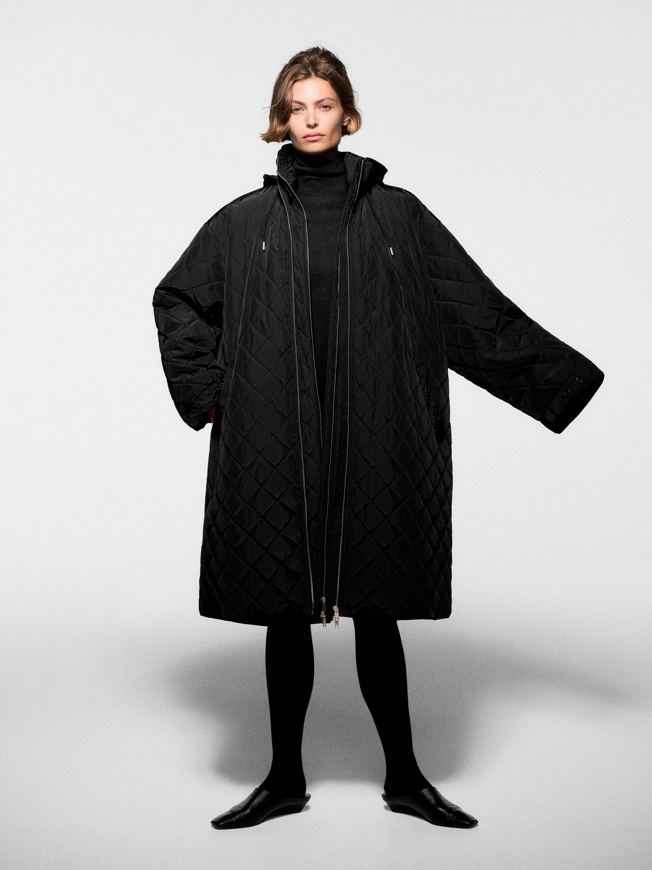 Long water-repellent oversize quilted parka