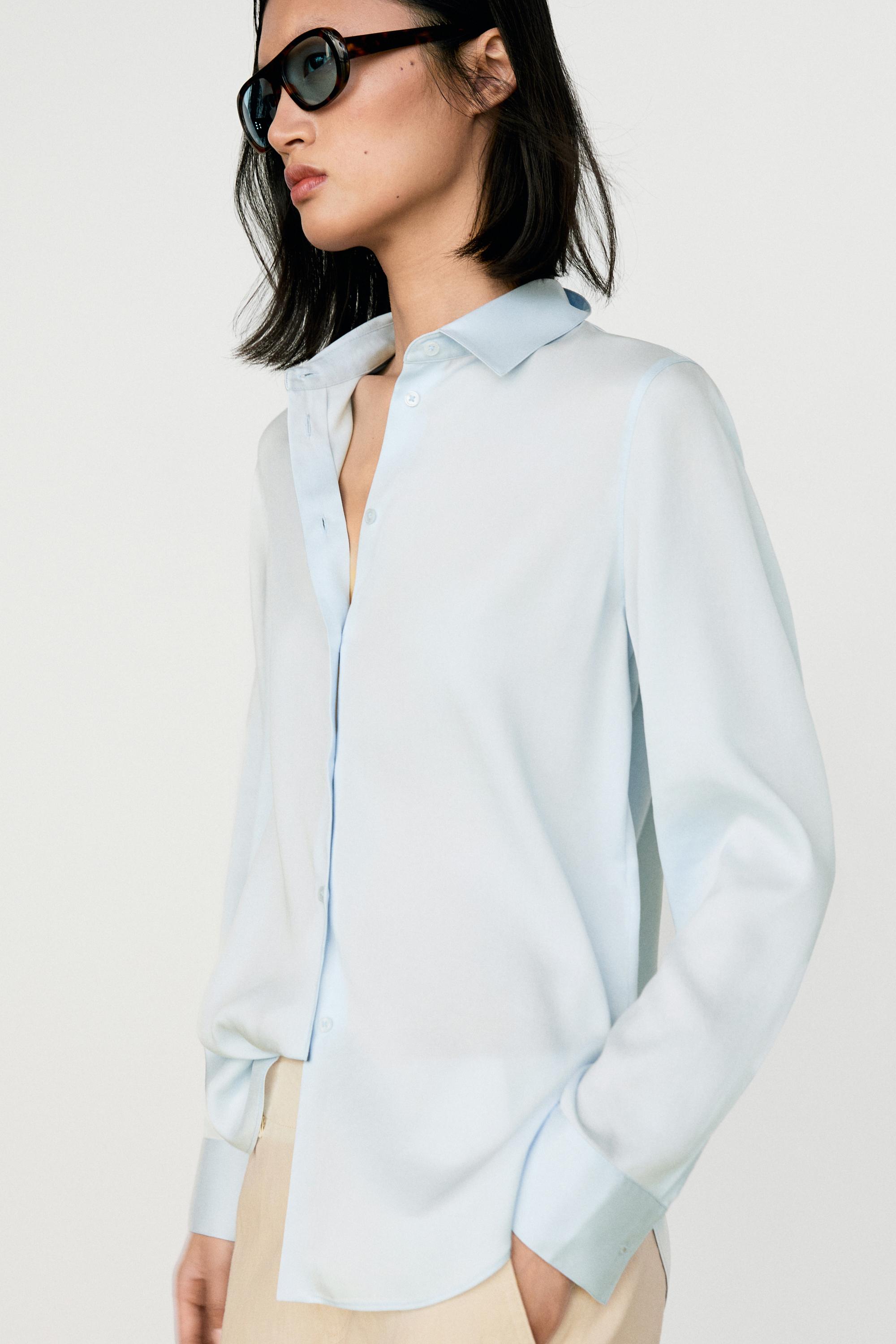 ladies blue dress shirt Design Generation 3/4 Sleeve Stretch Poplin Blouse easily dressed up or down Light Blue Poplin Shirt: Oversized