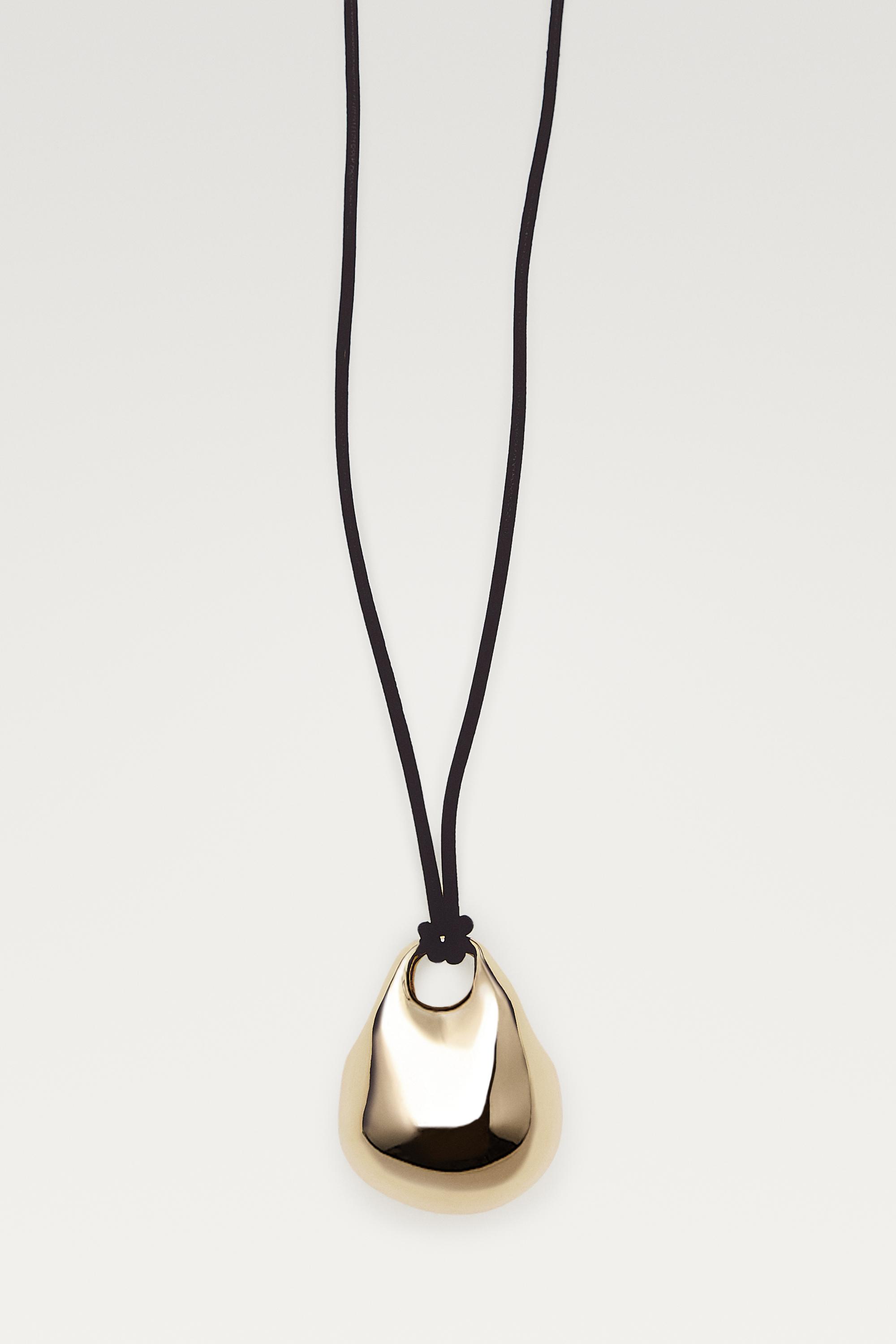 Oval bag pendant necklace — GOLDEN