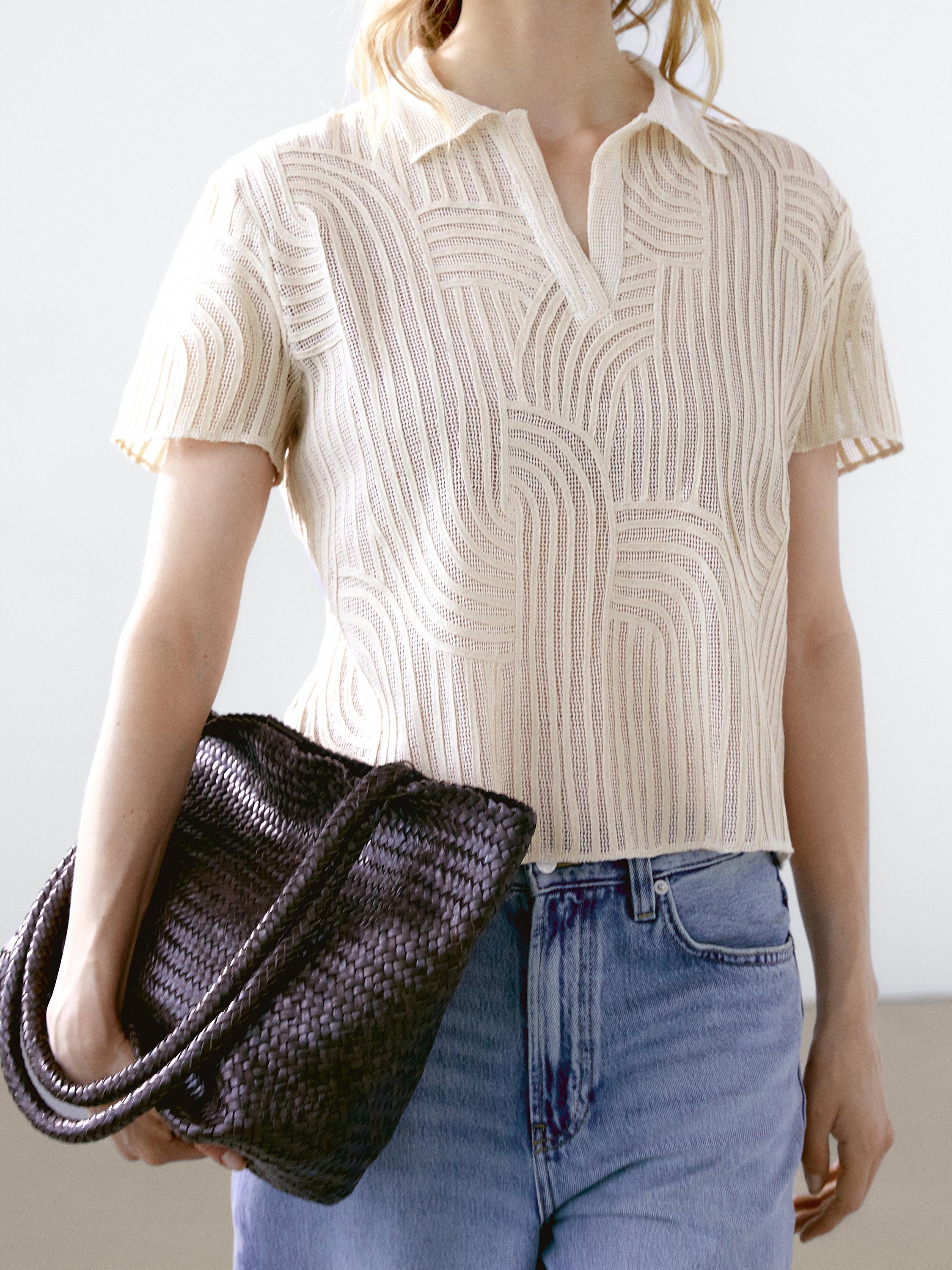 قميص بولو بتطريز مخرم