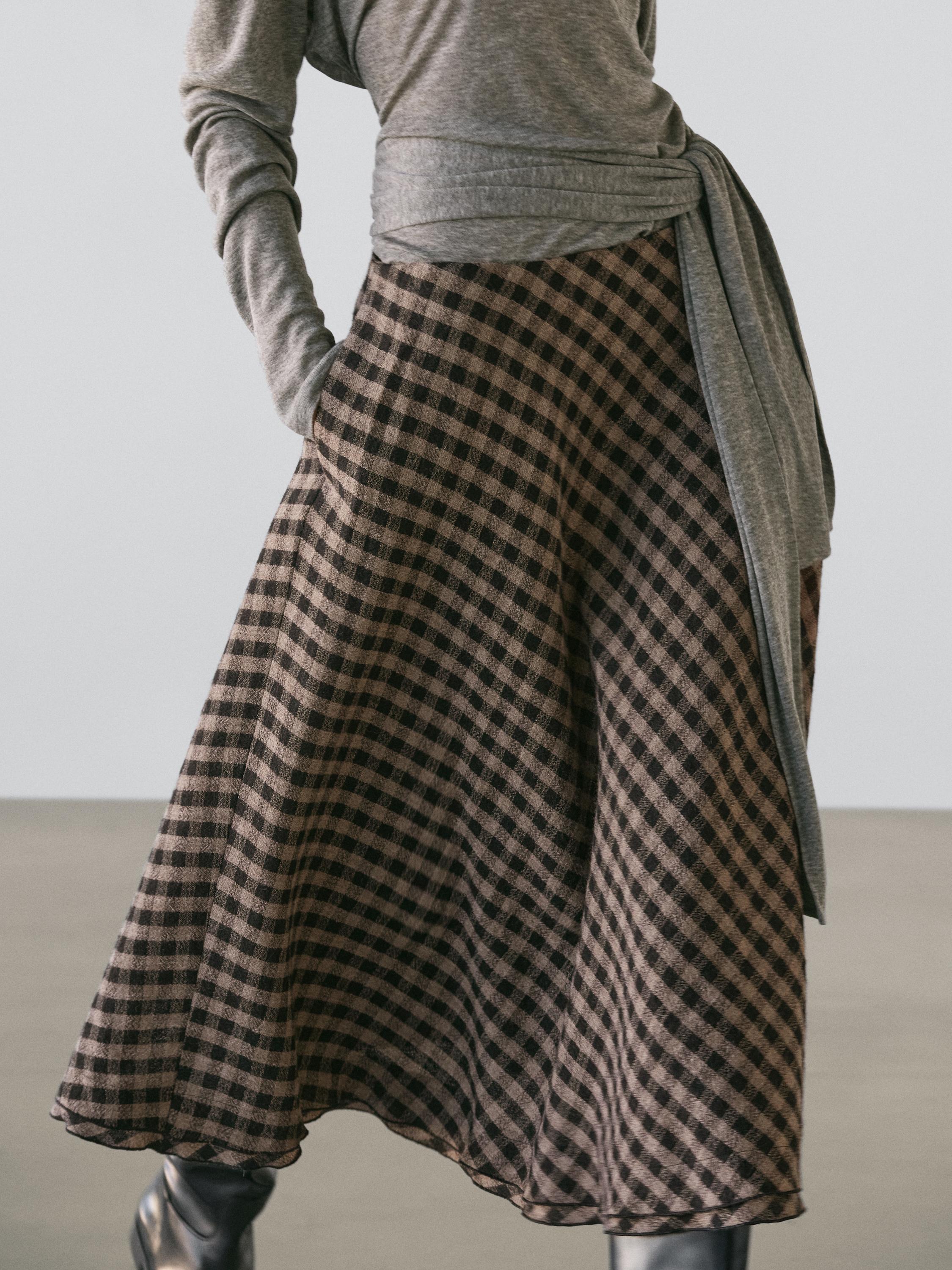 Расклешенная юбка в клетку