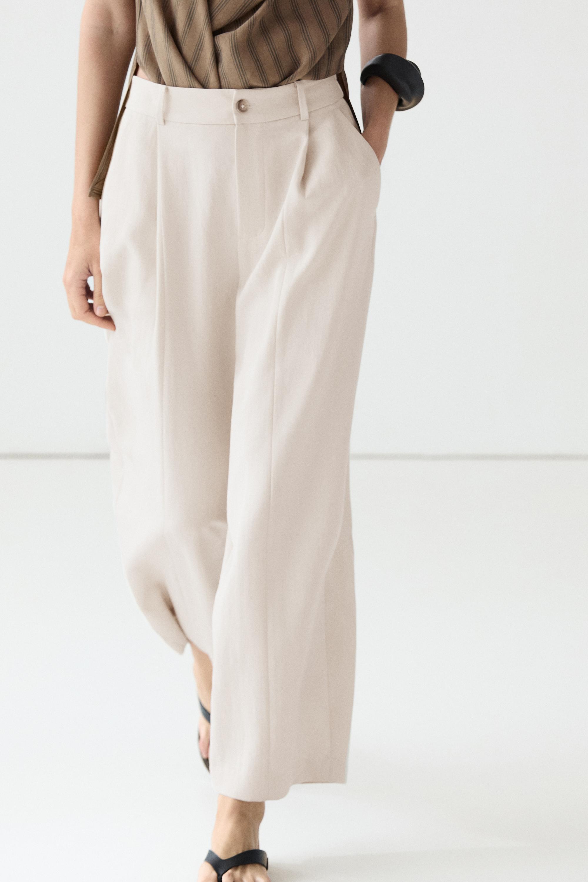 Flowing pants with elasticated waistband — CREAM