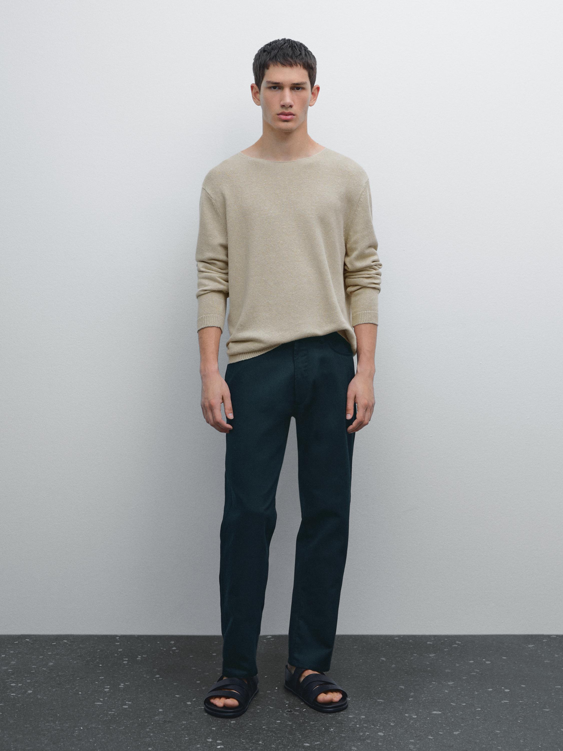 Cotton blend tapered fit denim trousers