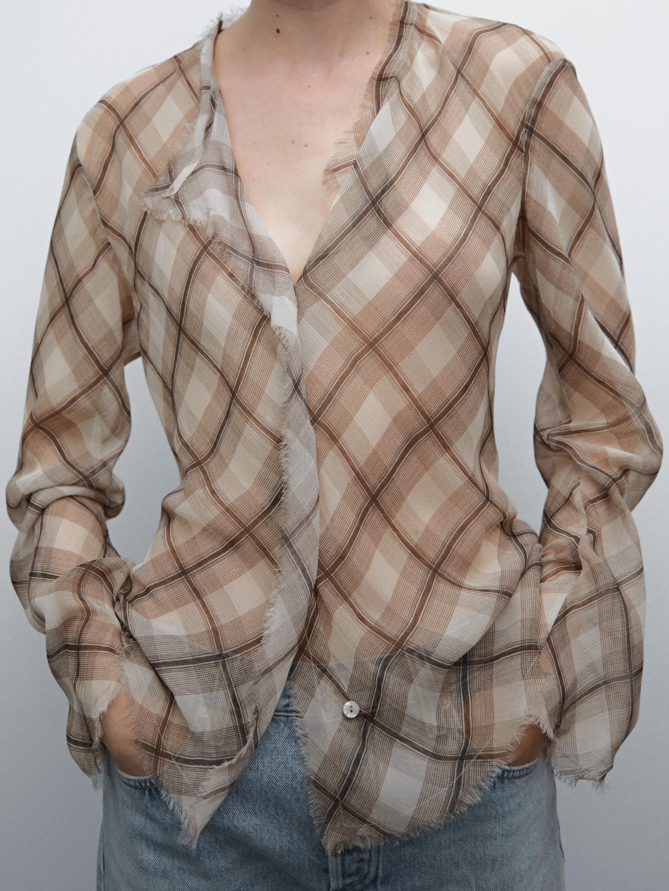 Check shirt with frayed trims
