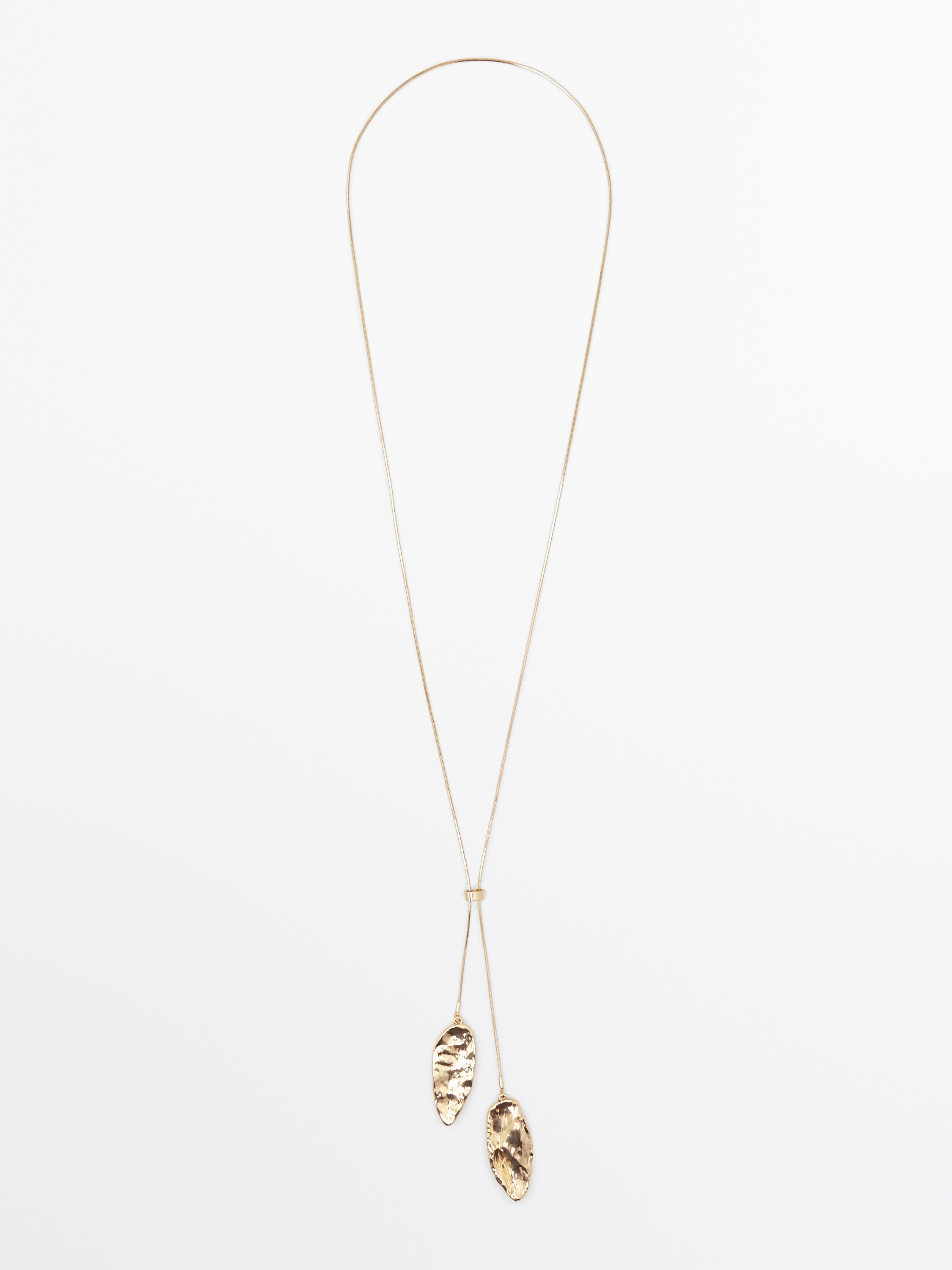 Adjustable necklace with textured pieces