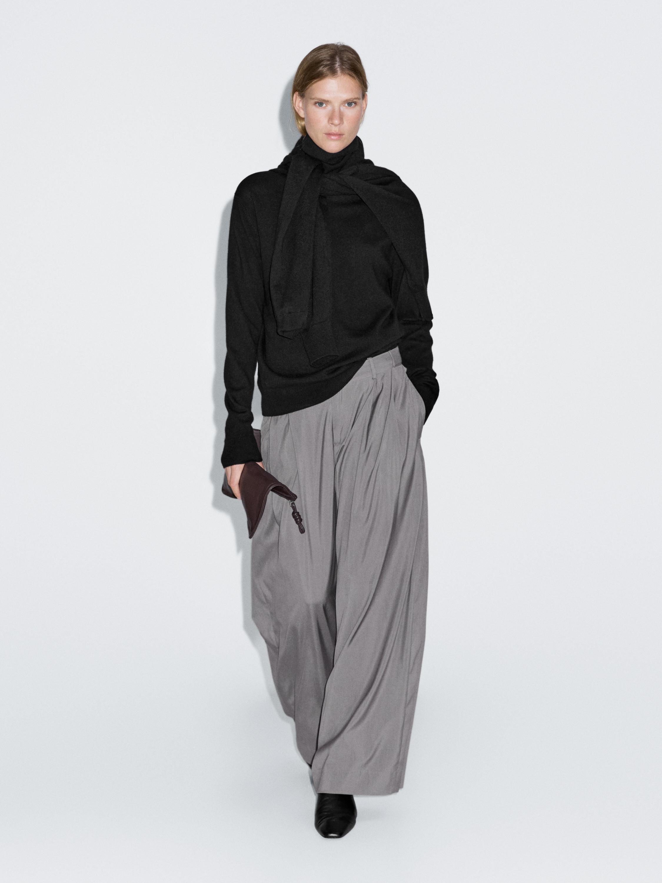 Wool blend knit sweater with high neck