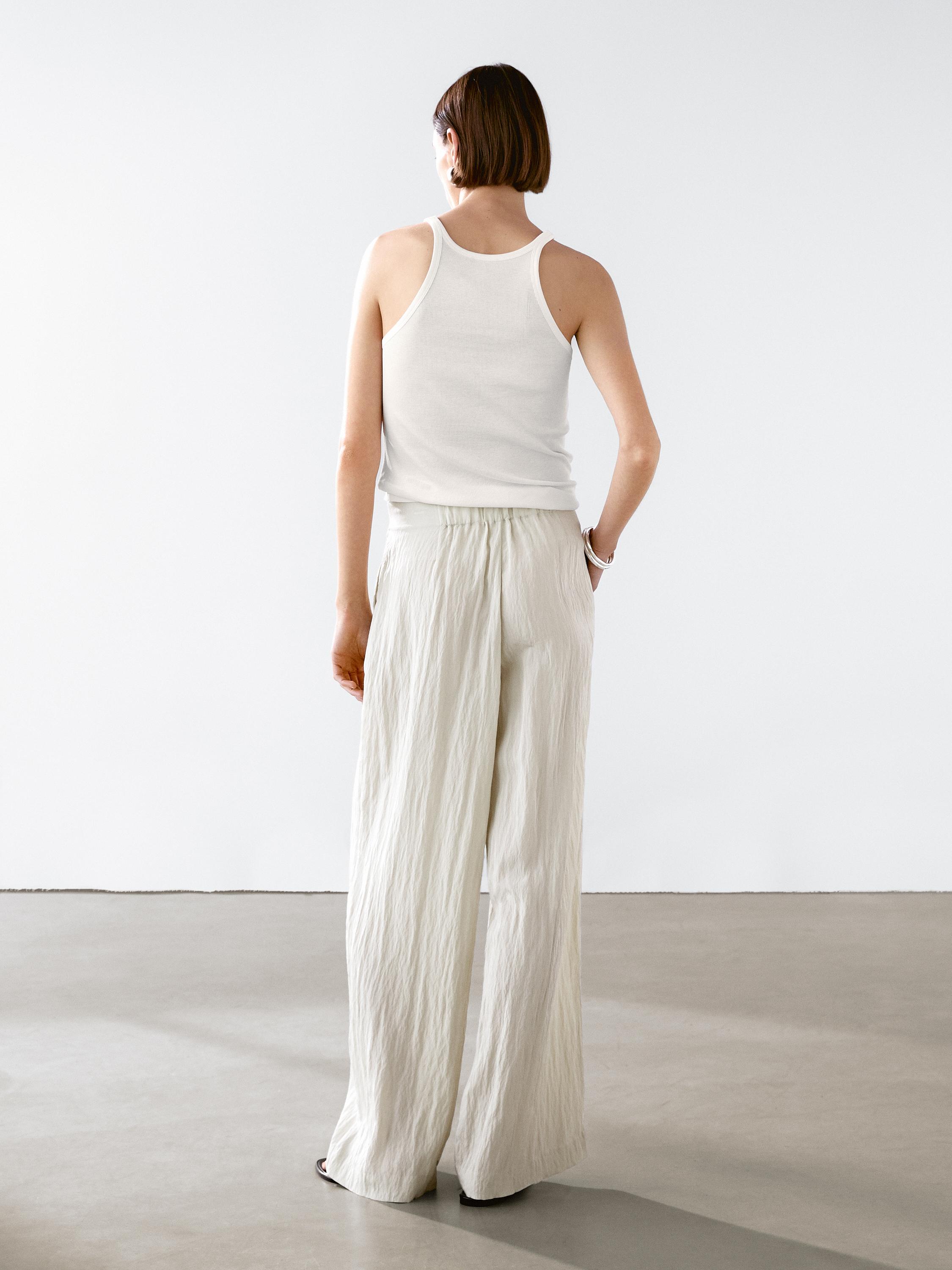 Technical trousers with darts