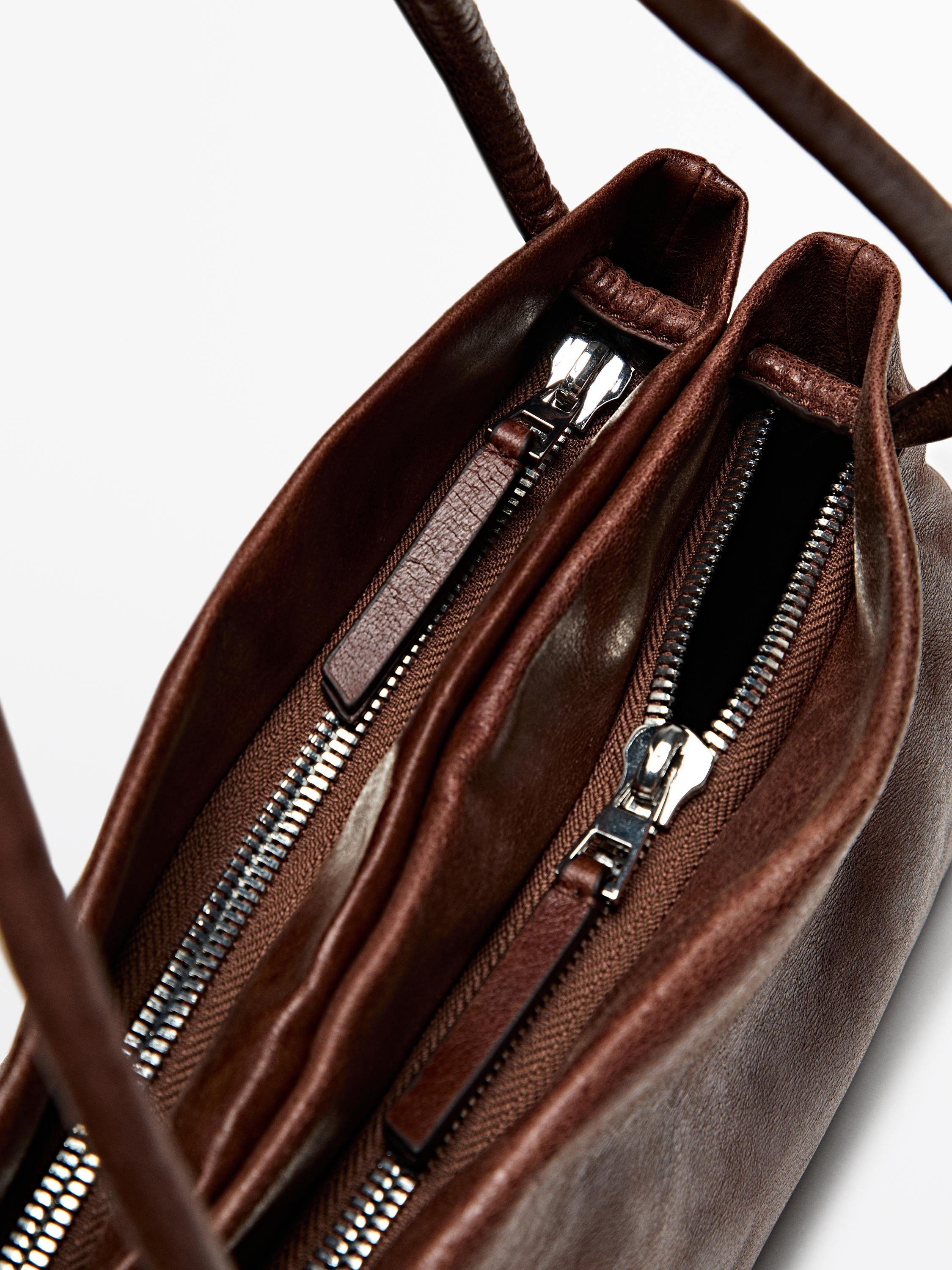 Small nappa leather bag with compartments