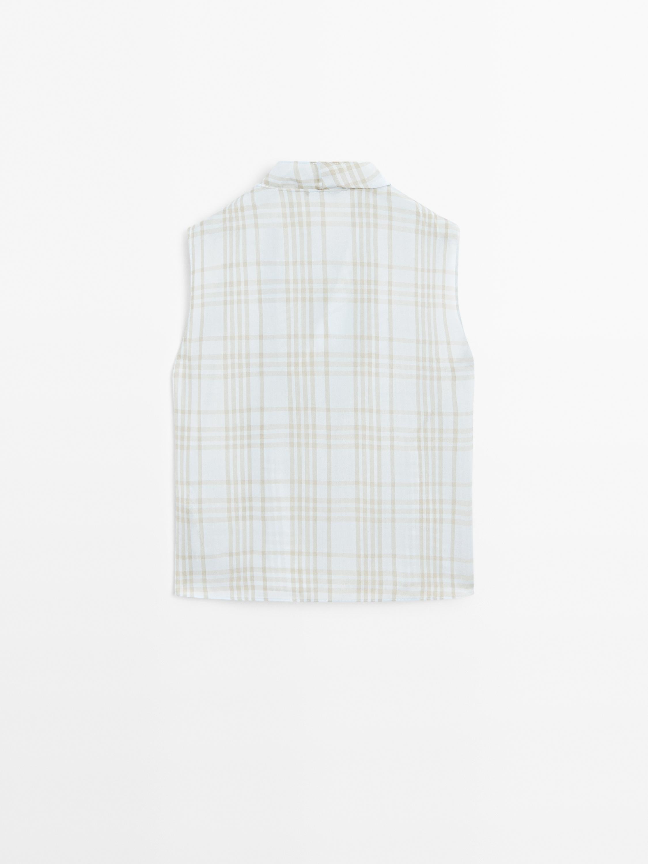 Draped neck check top