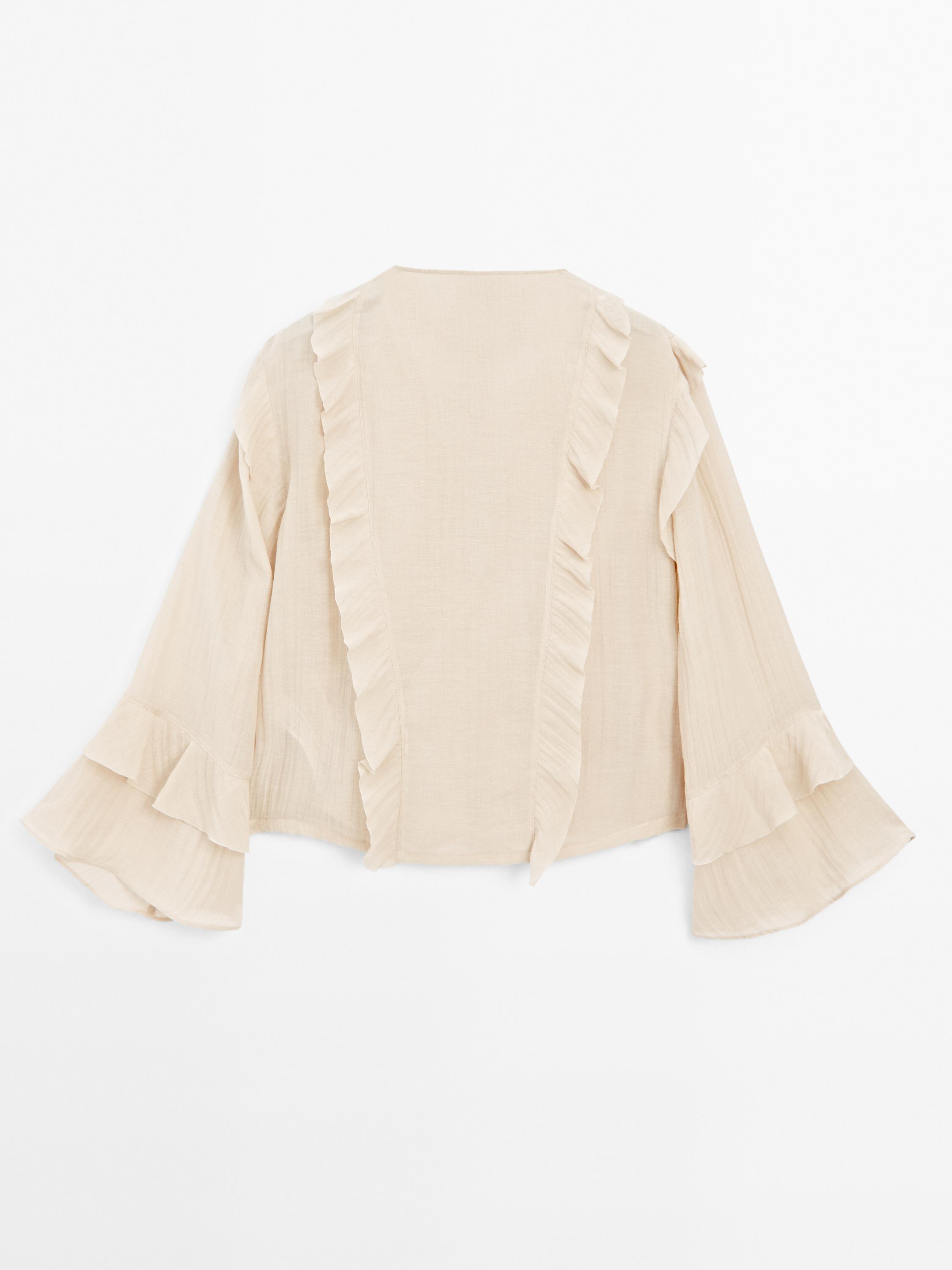 Flowing blouse with ruffles