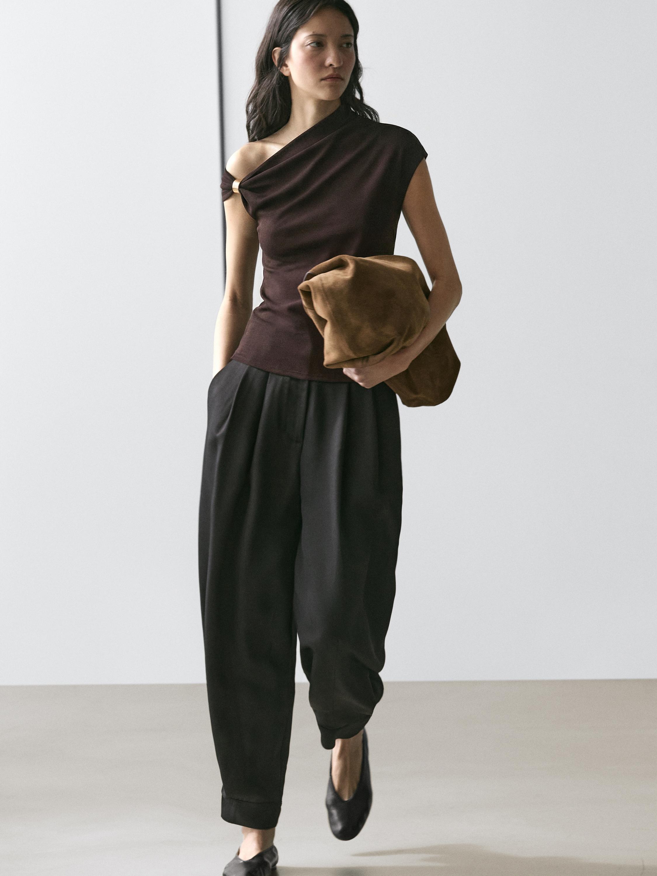 Asymmetric top with brooch detail