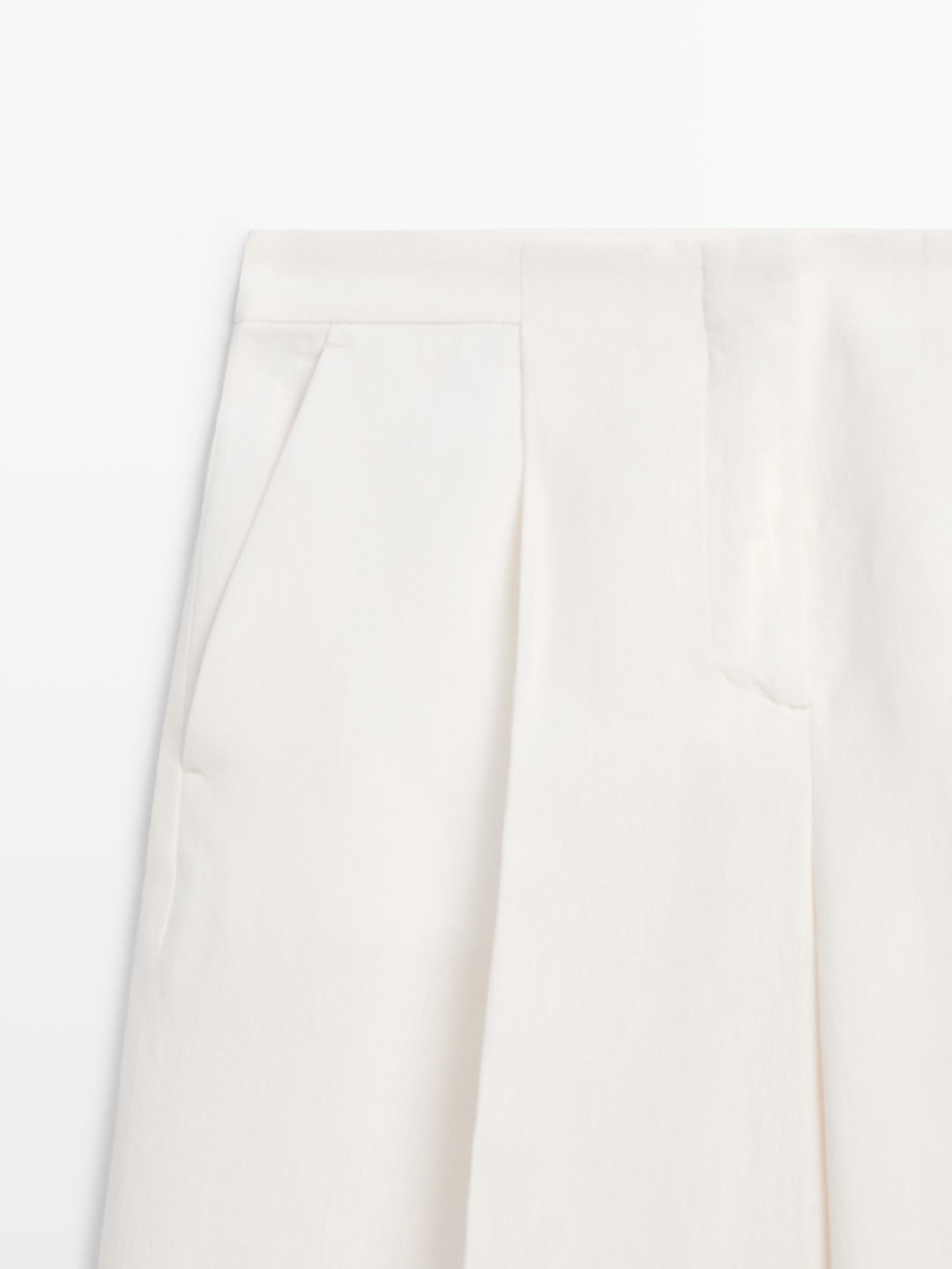 Flowing linen suit trousers — Off white