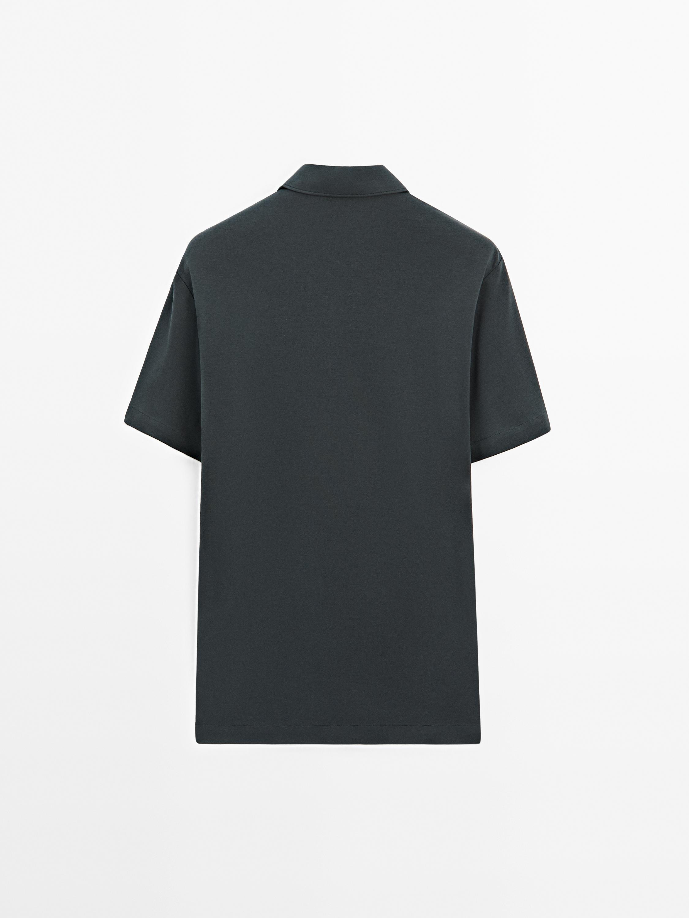 Short sleeve polo shirt with snap-button placket