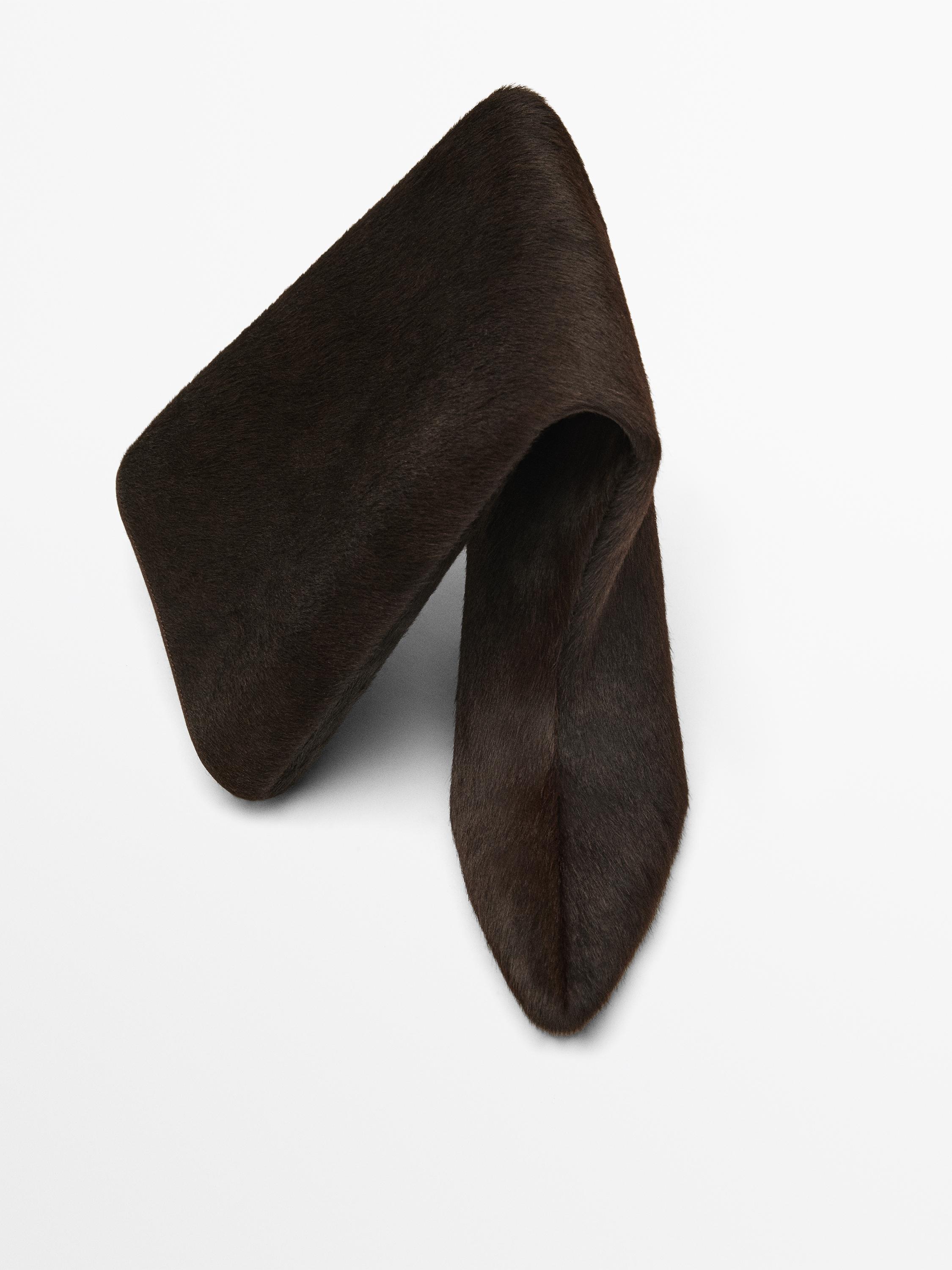 Hair on leather heeled boots