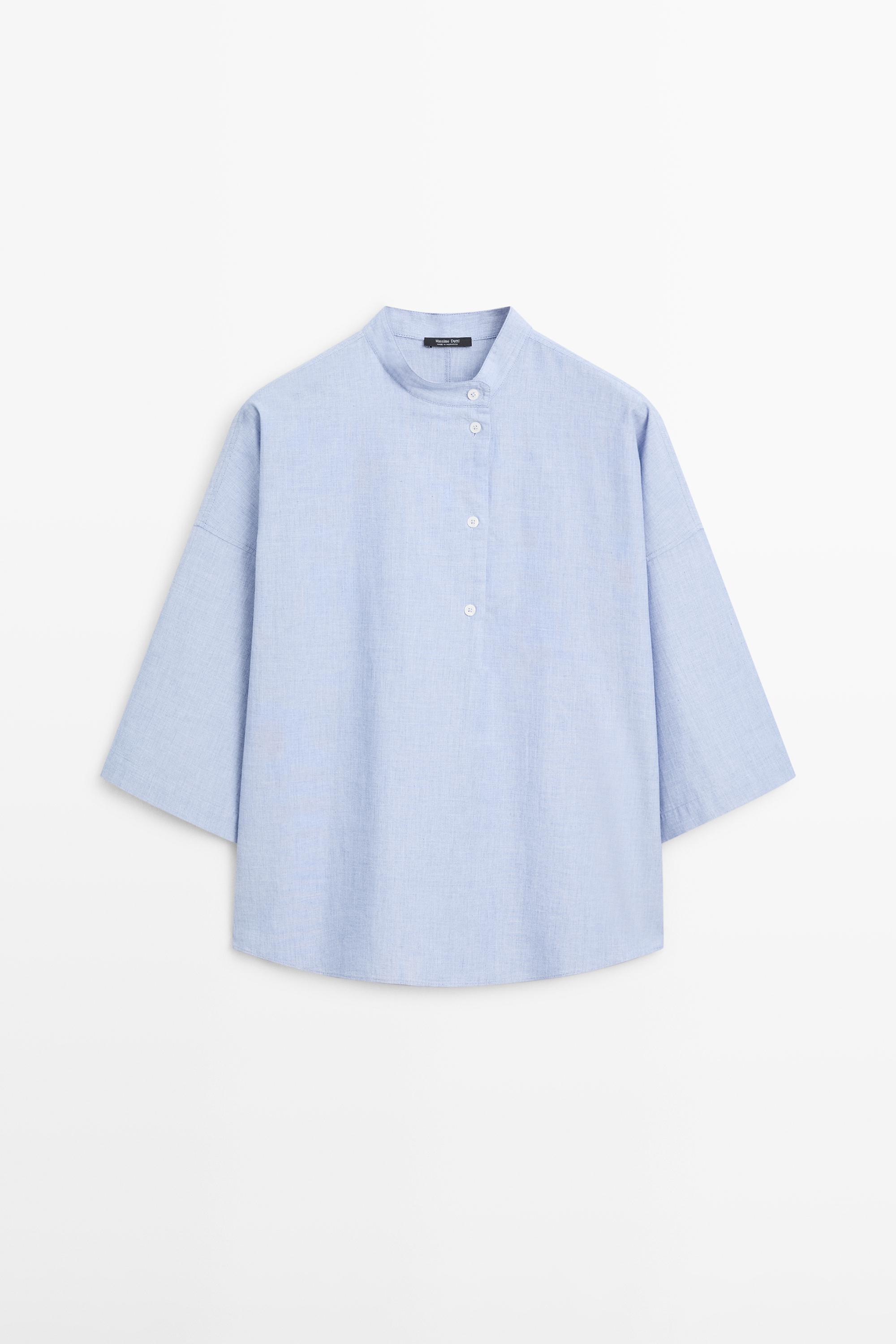 Flowing blouse with buttoned collar detail — Denim blue
