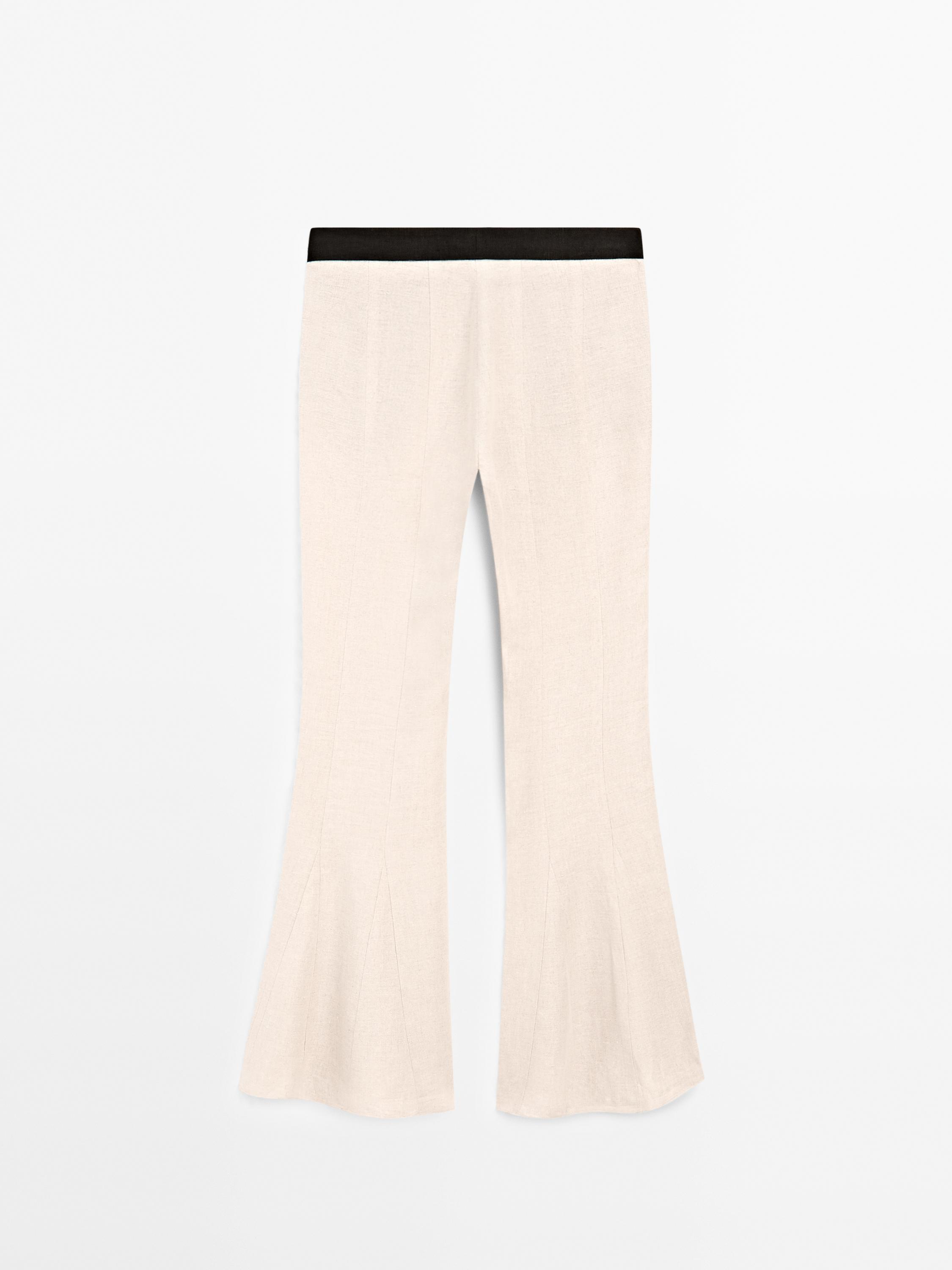 Flared trousers with contrast waist