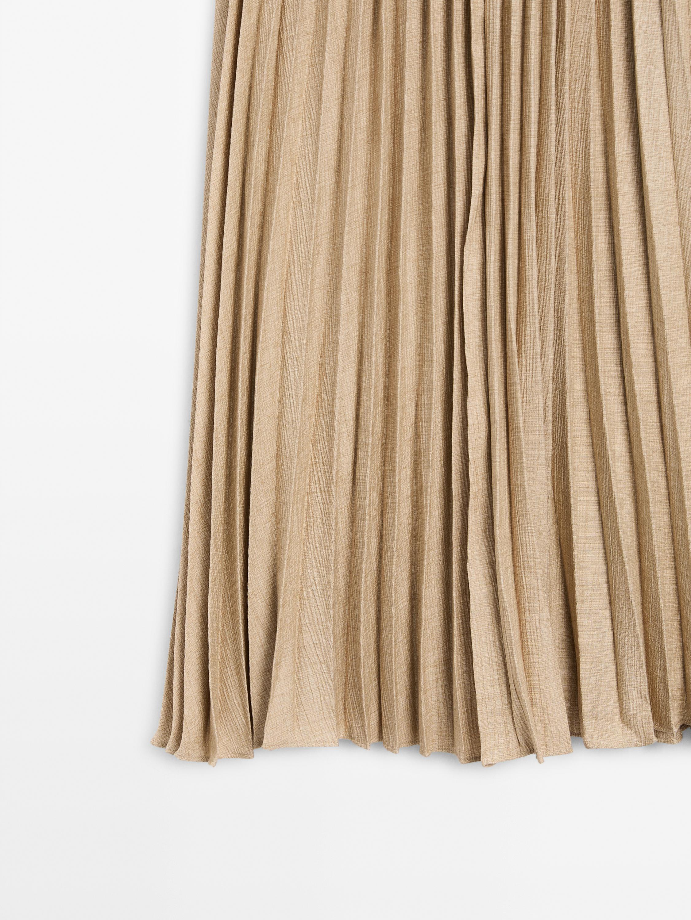 Pleated midi skirt with fabric detail