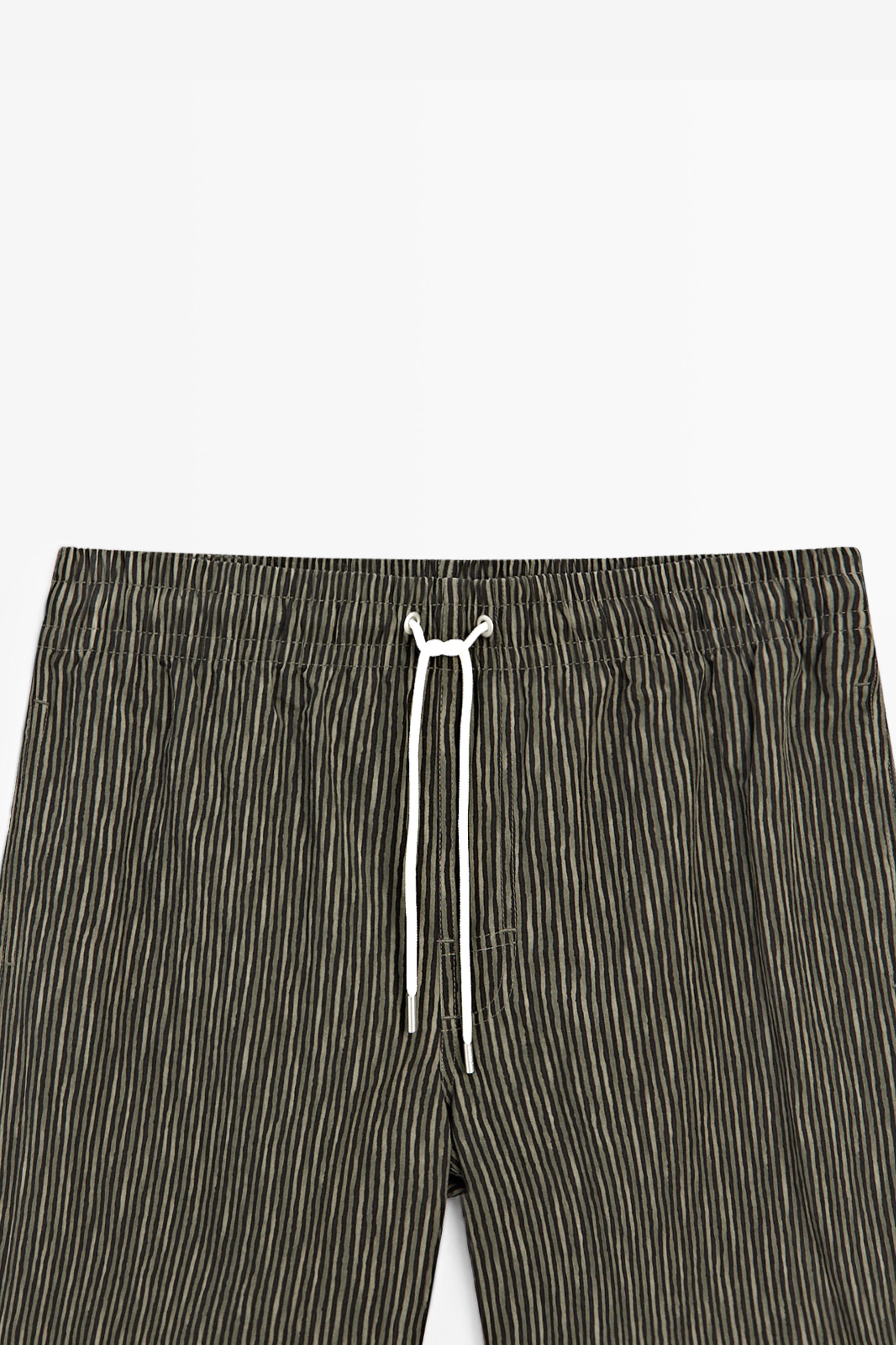 Striped print swimming trunks — KHAKI
