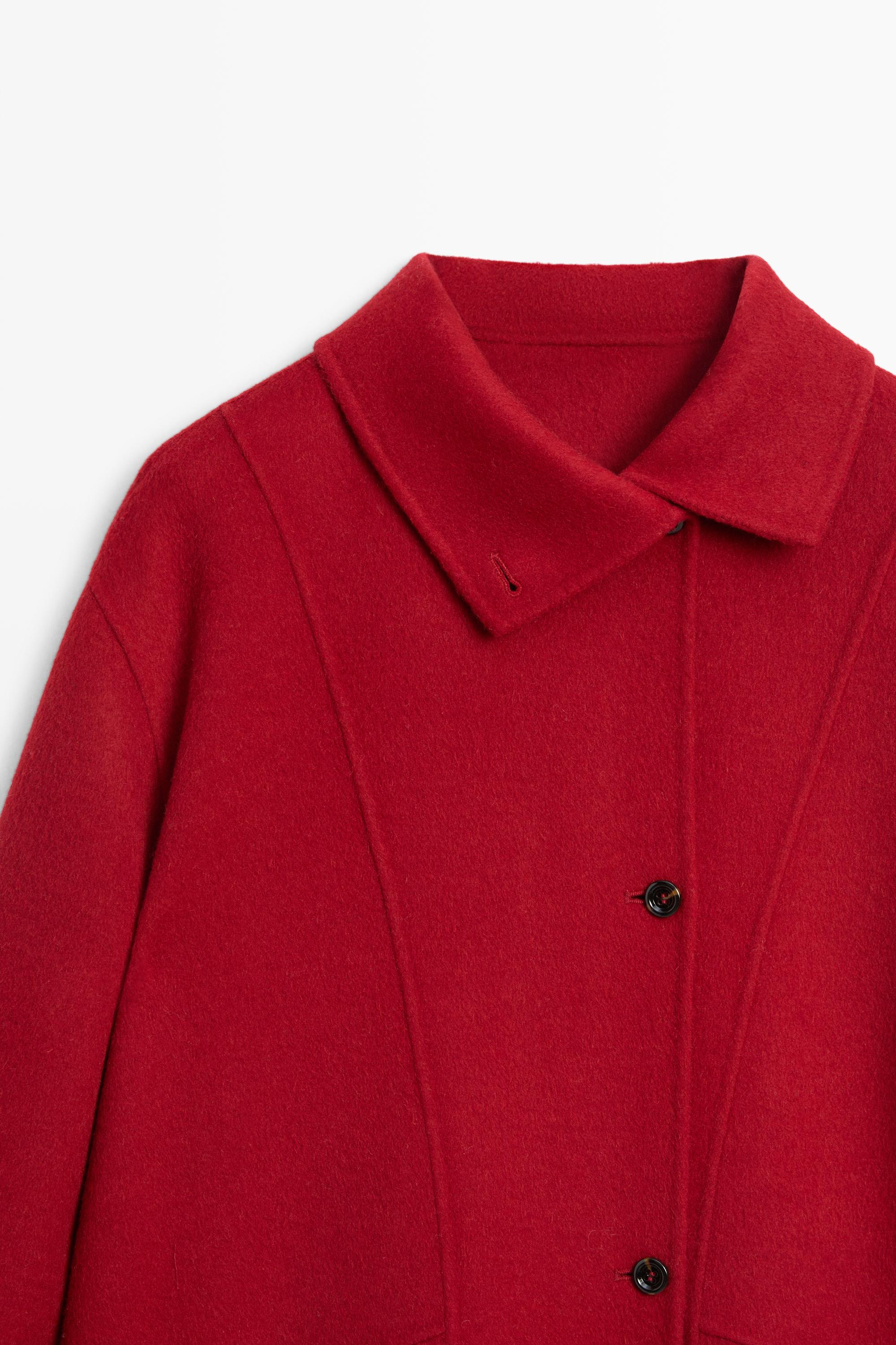Long coat with asymmetrical collar detail