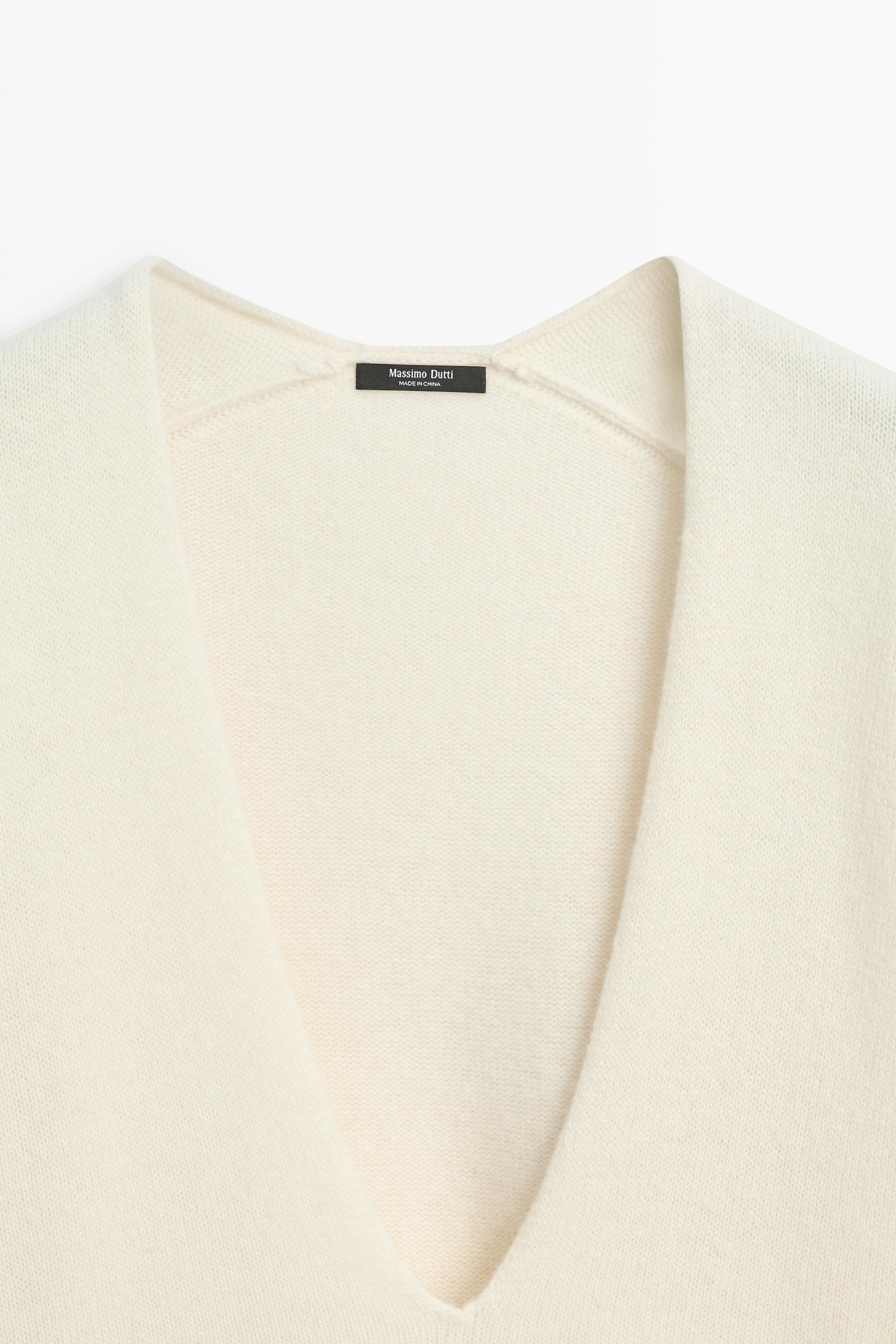 Long-line knit sweater with neckline detail — OCHRE MARL