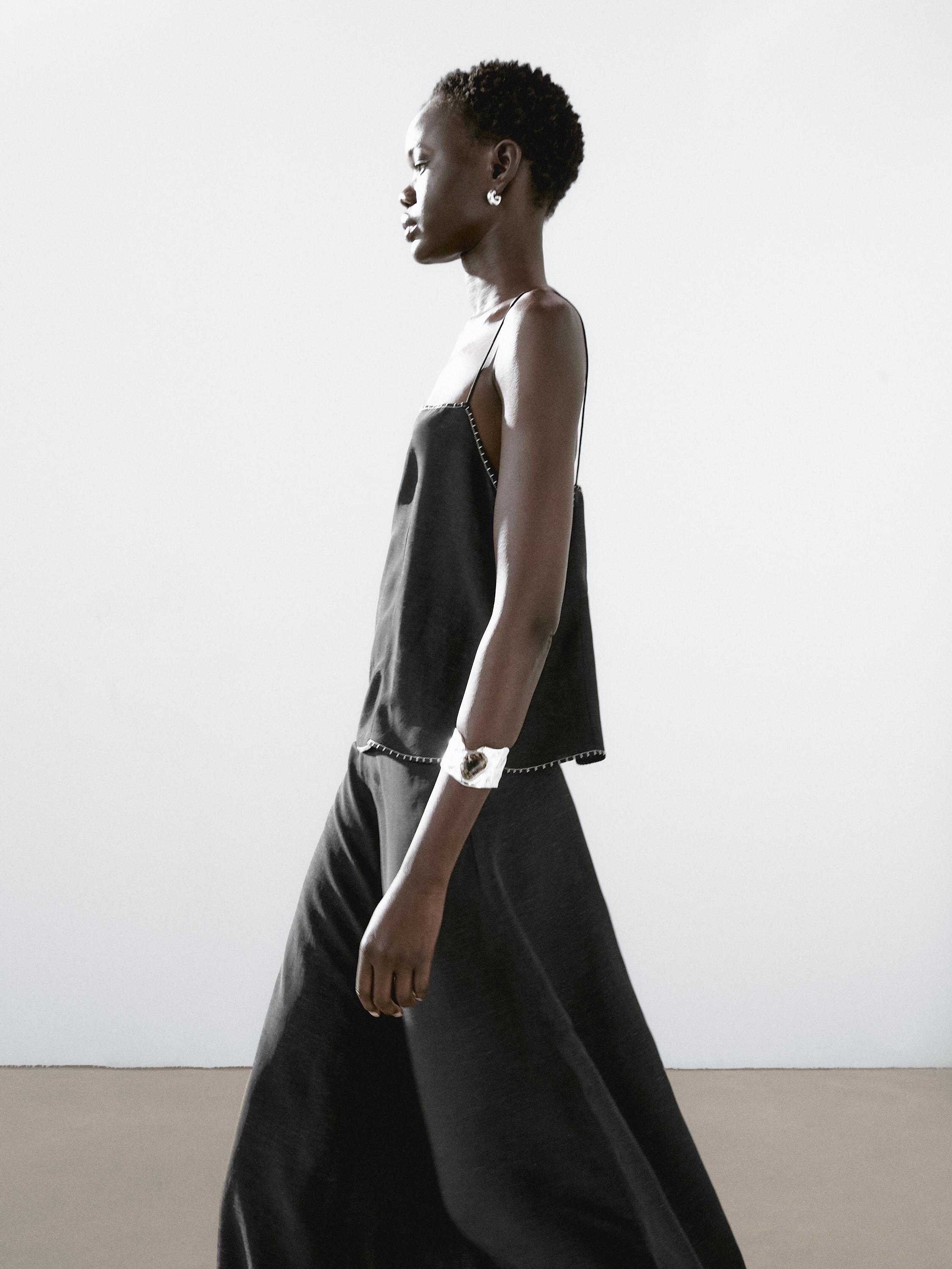 Strappy top with contrast topstitching