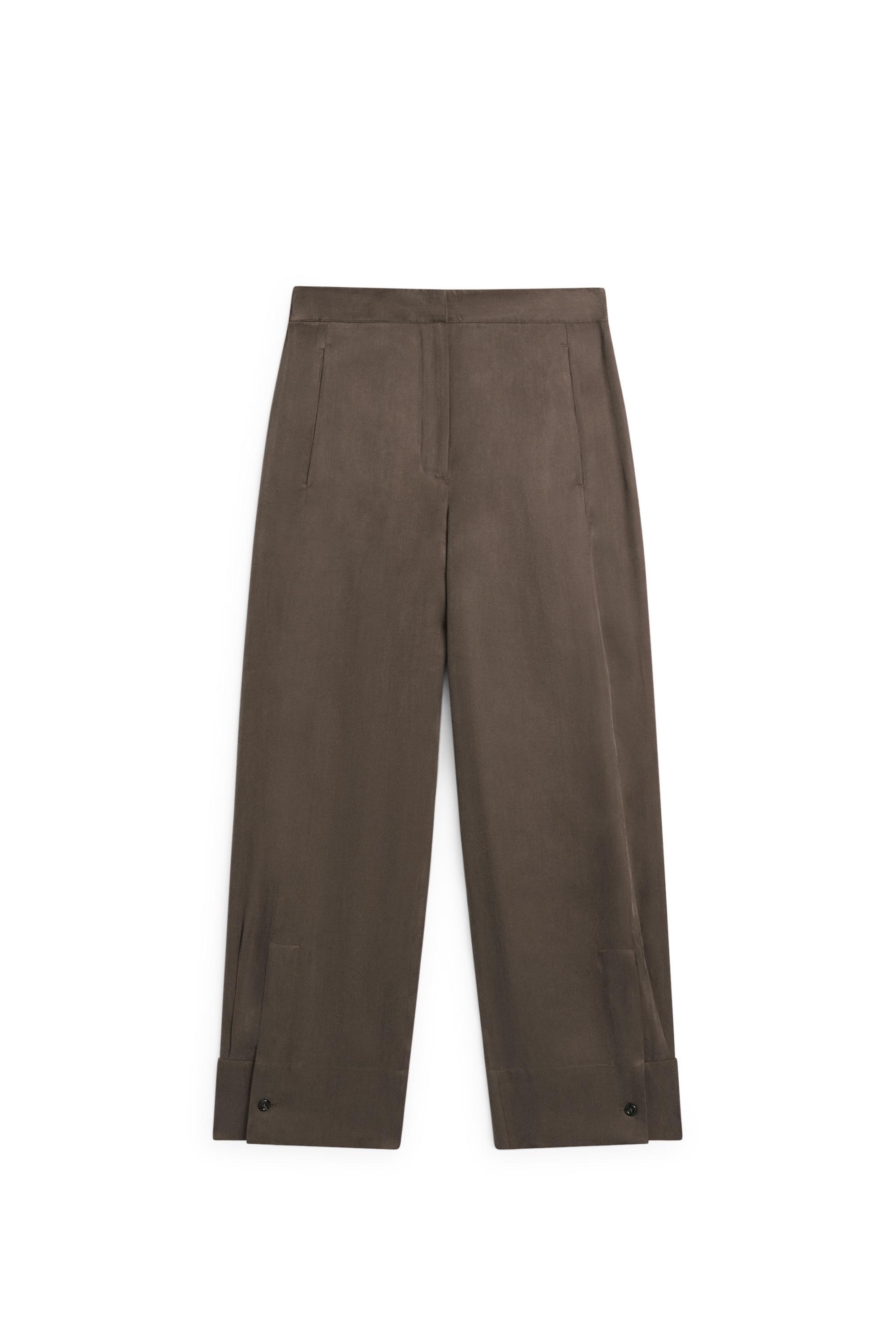 Total look flowing trousers with buttoned hems — PLUM