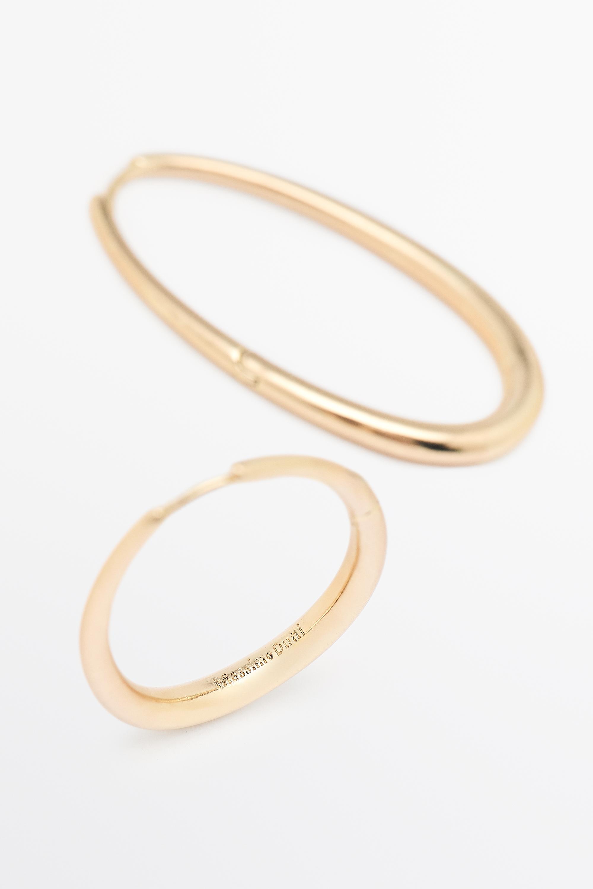 Oval hoop earrings — GOLDEN