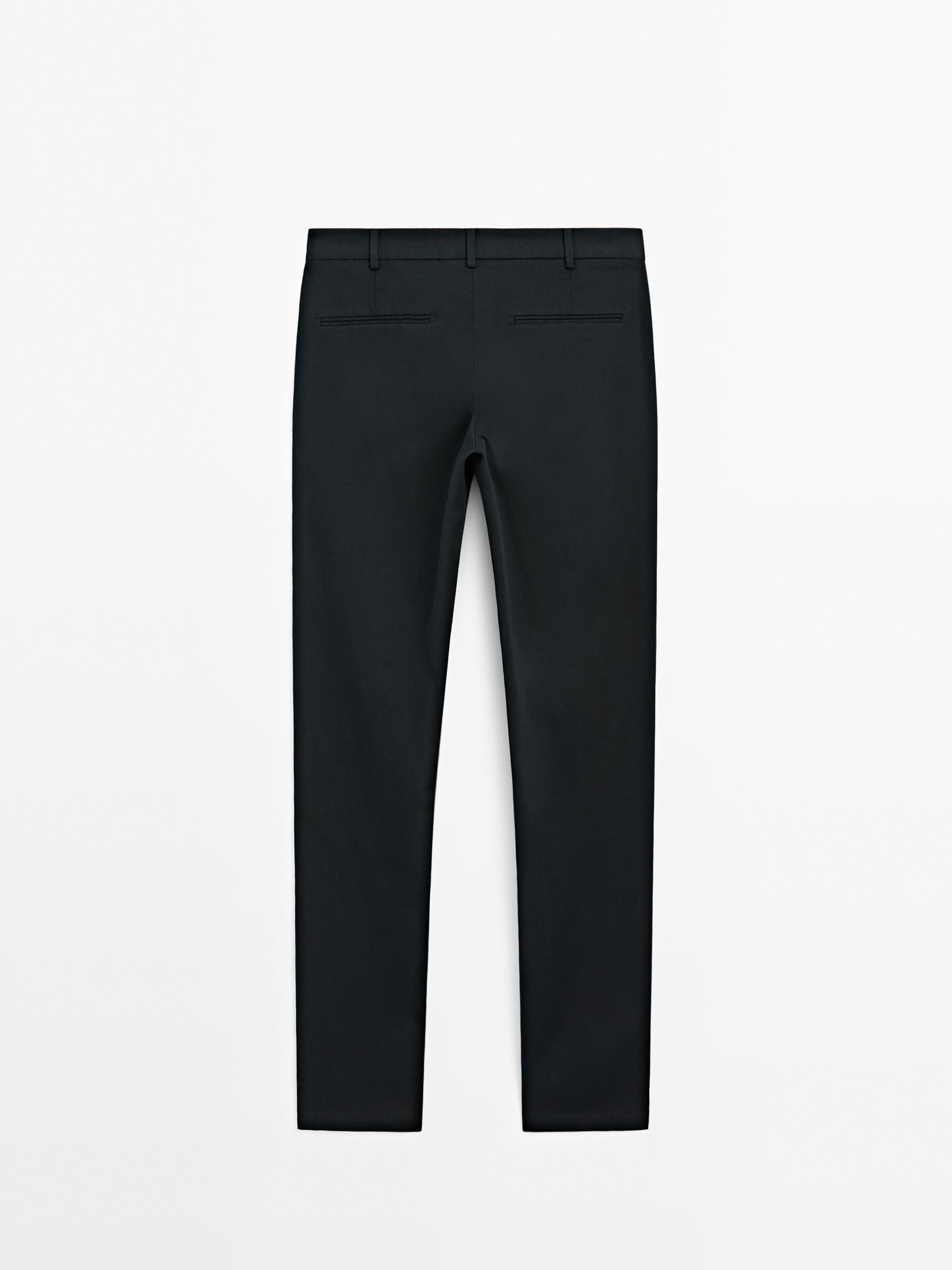 Cotton blend textured slim fit trousers