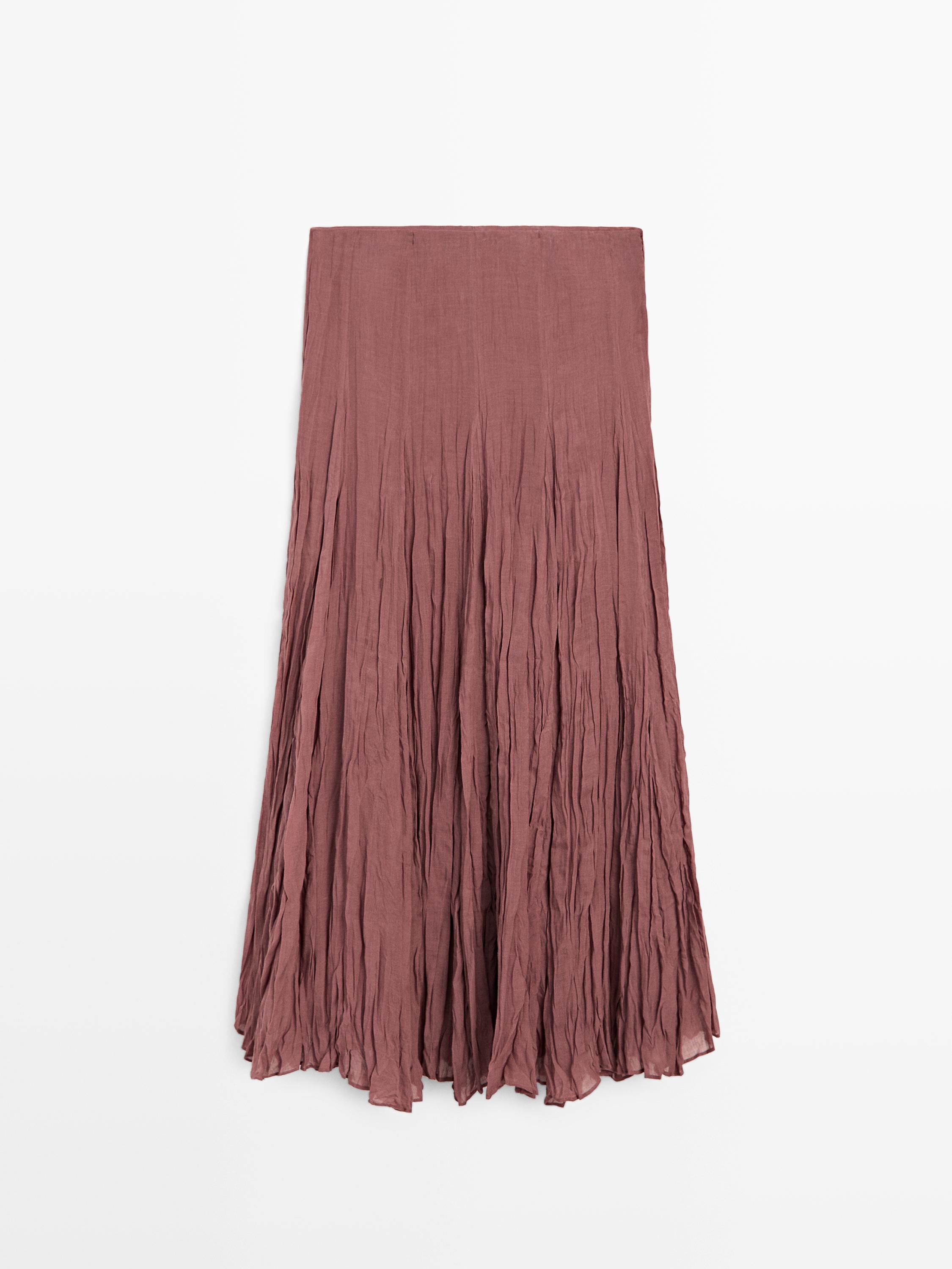 Falda midi fluida godets