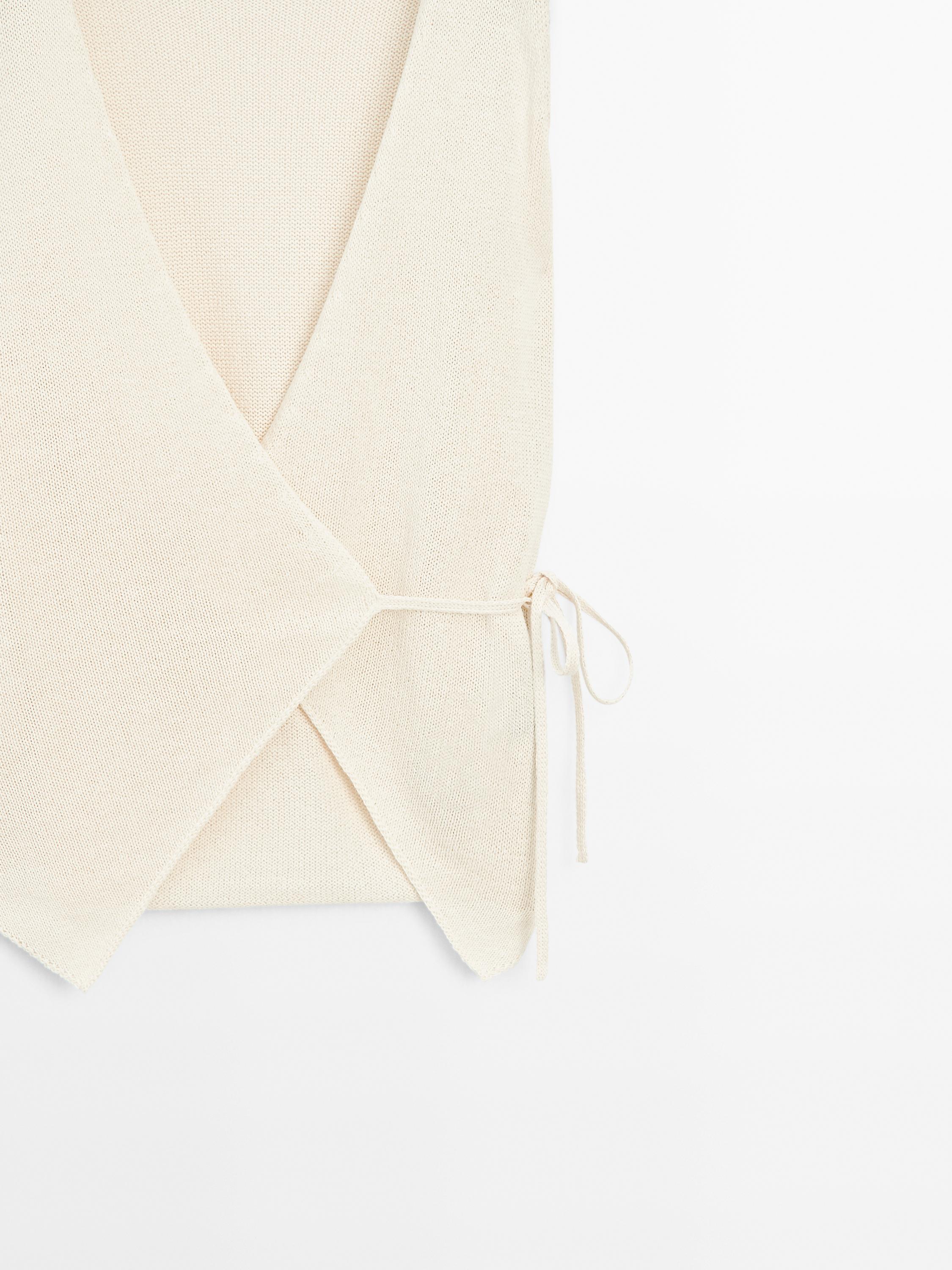 Knit crossover waistcoat with drawstring