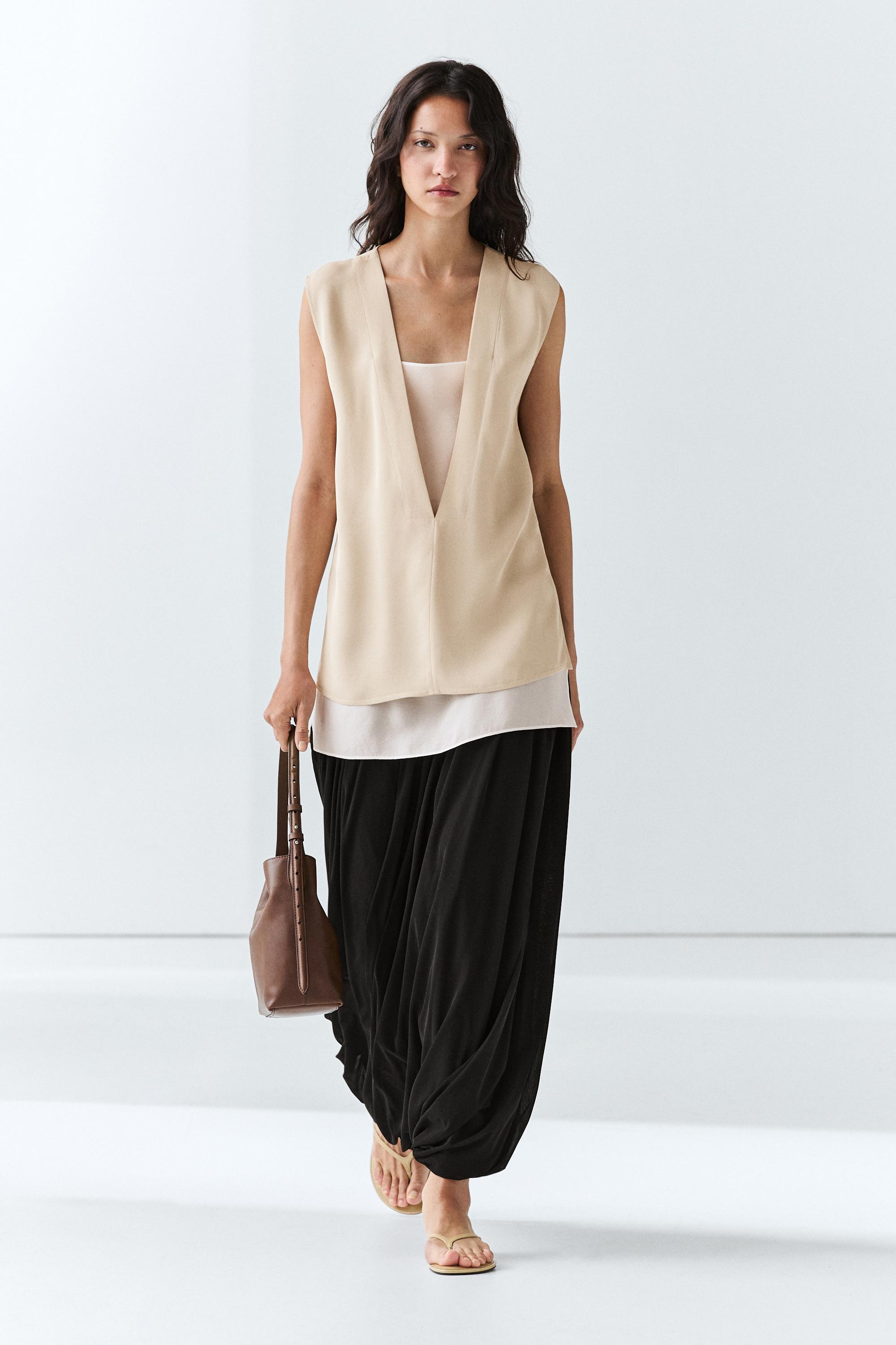 Flowing double-layer top with contrast detail — CREAM