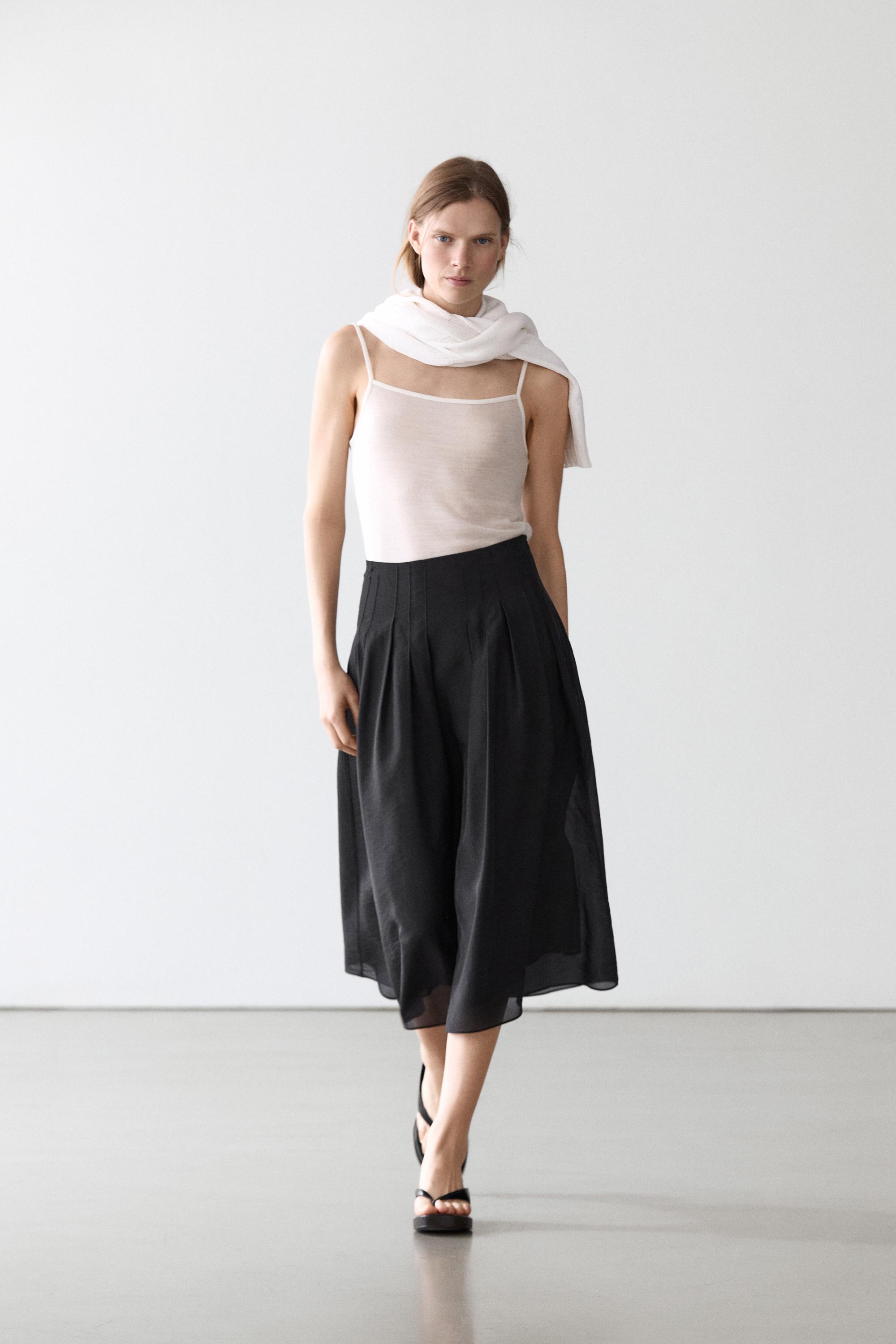 Flowing midi skirt with pintucks
