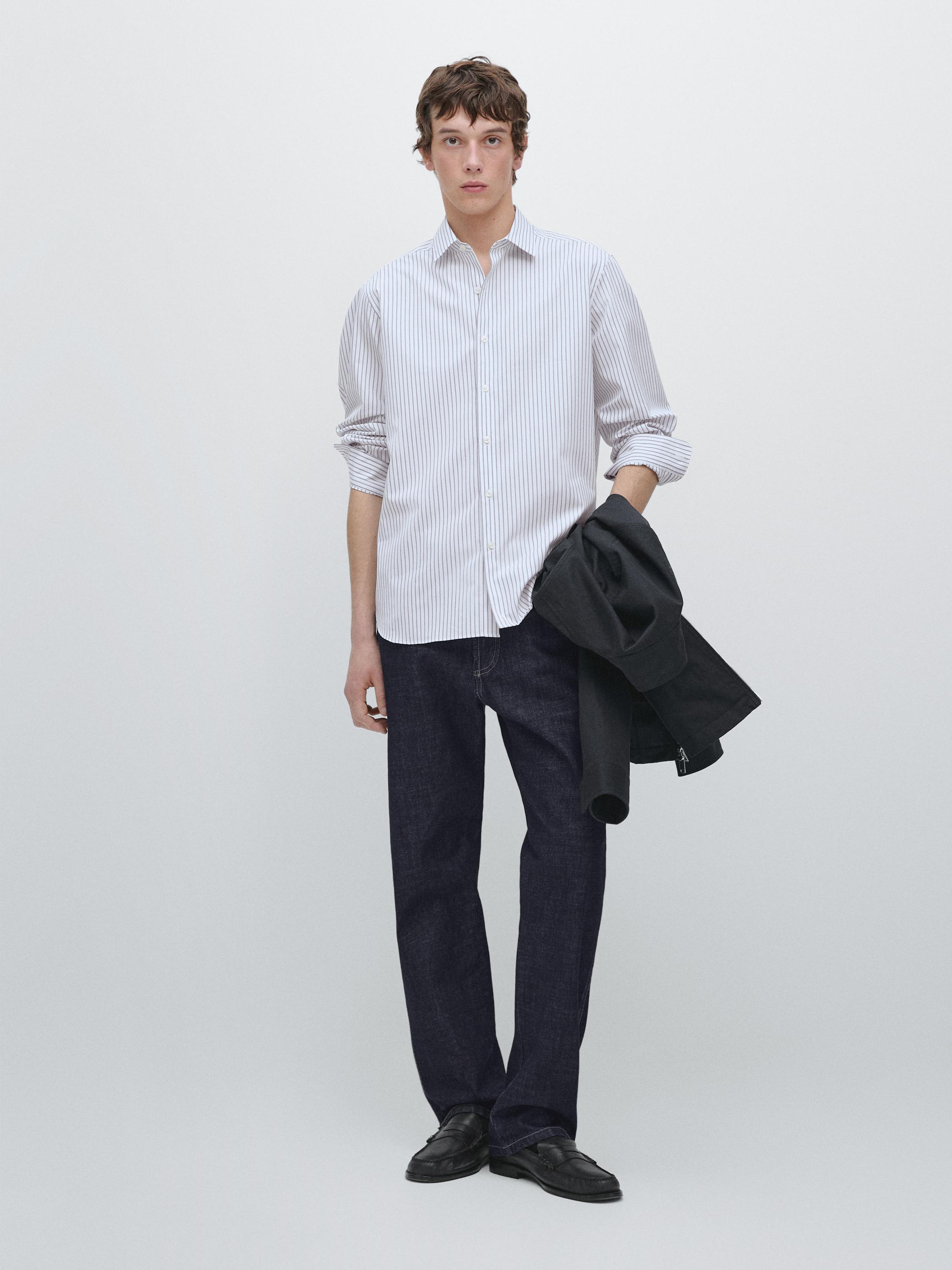 Light blue striped long-sleeve shirt and dark straight-leg pants set.