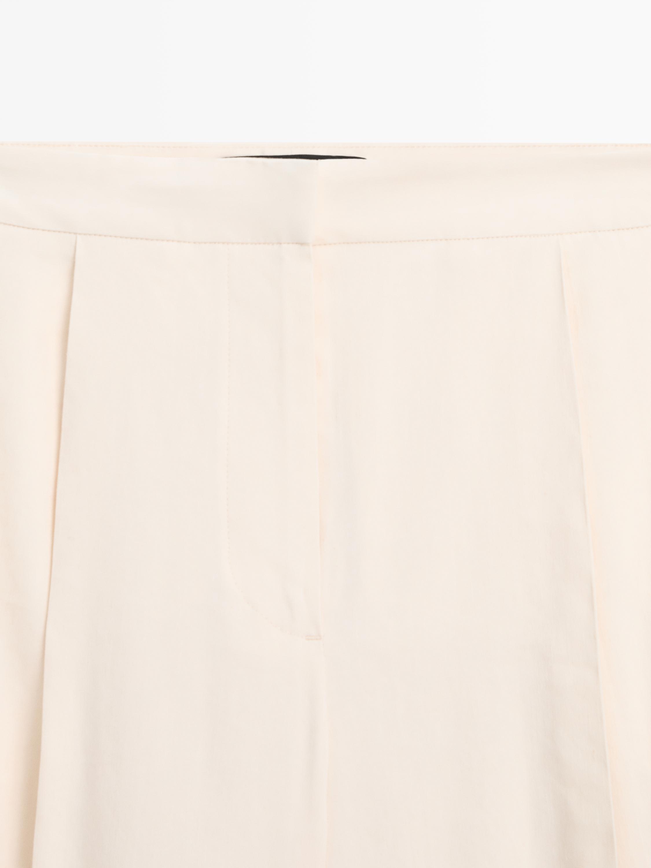 Flowing barrel fit trousers — CREAM
