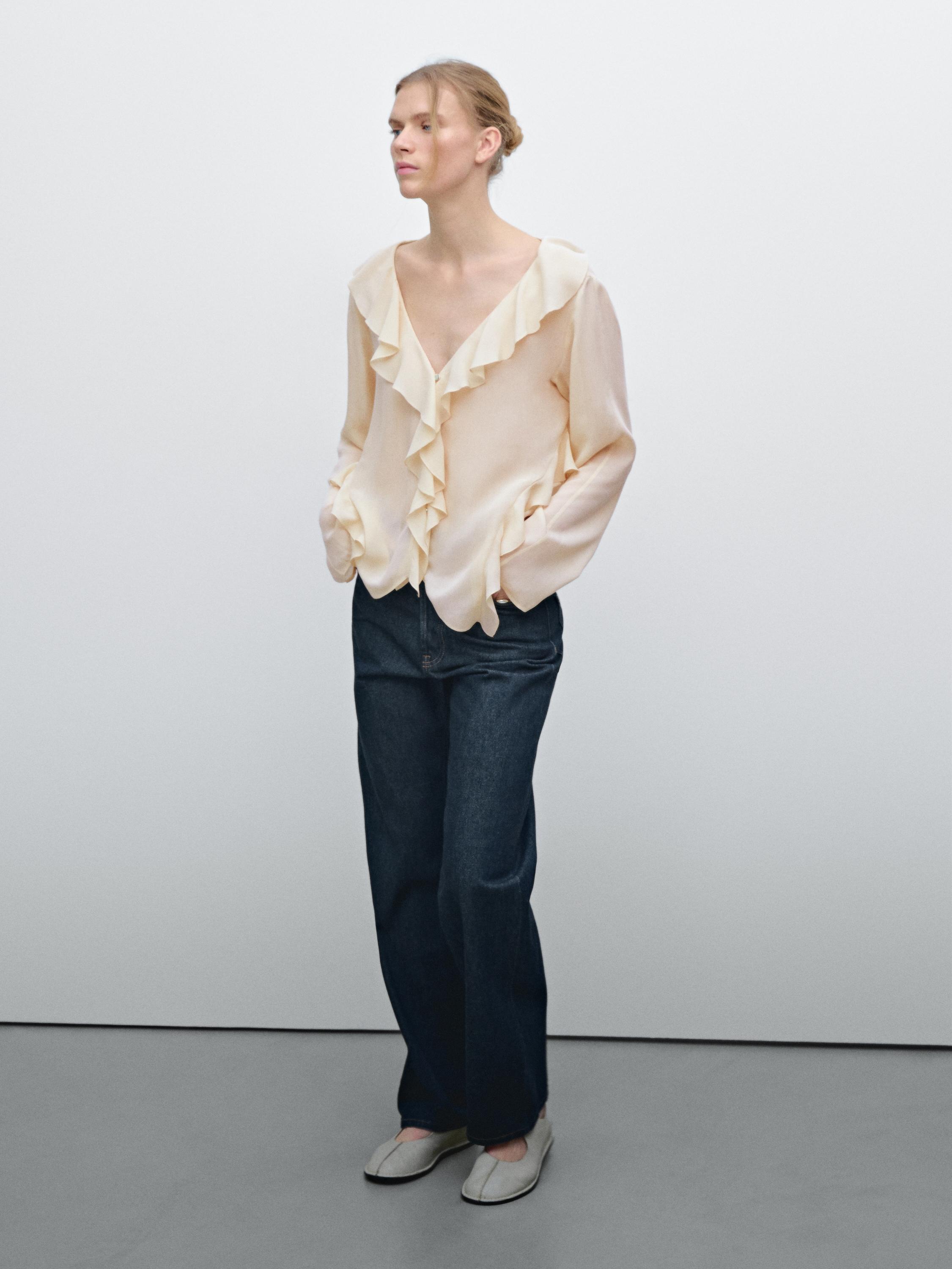 Blusa volantes baixo asimétrico